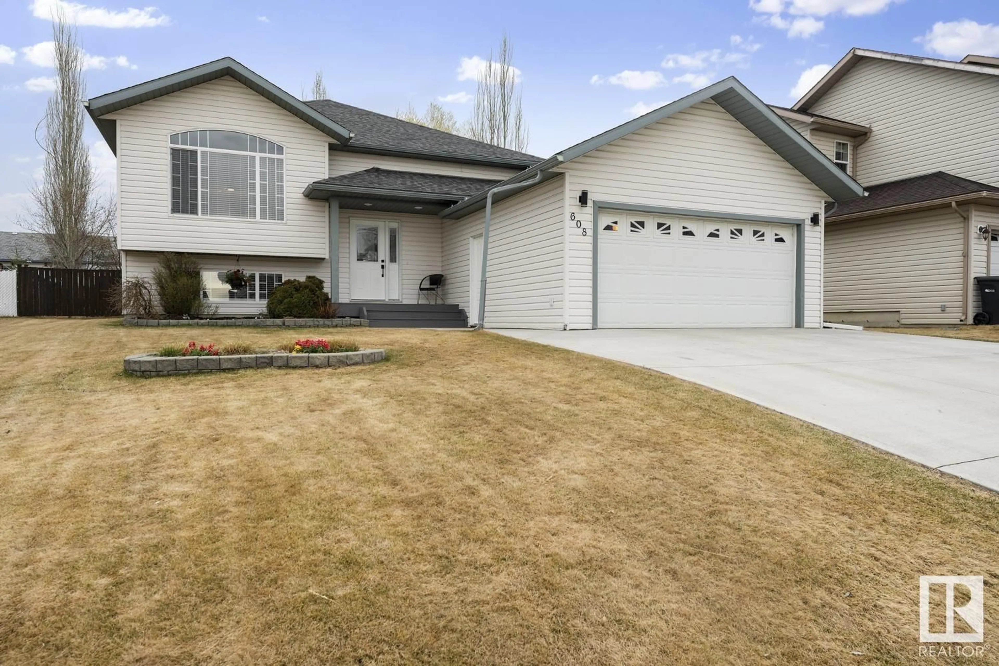 Home with vinyl exterior material, street for 608 20 ST, Cold Lake Alberta T9M1C6