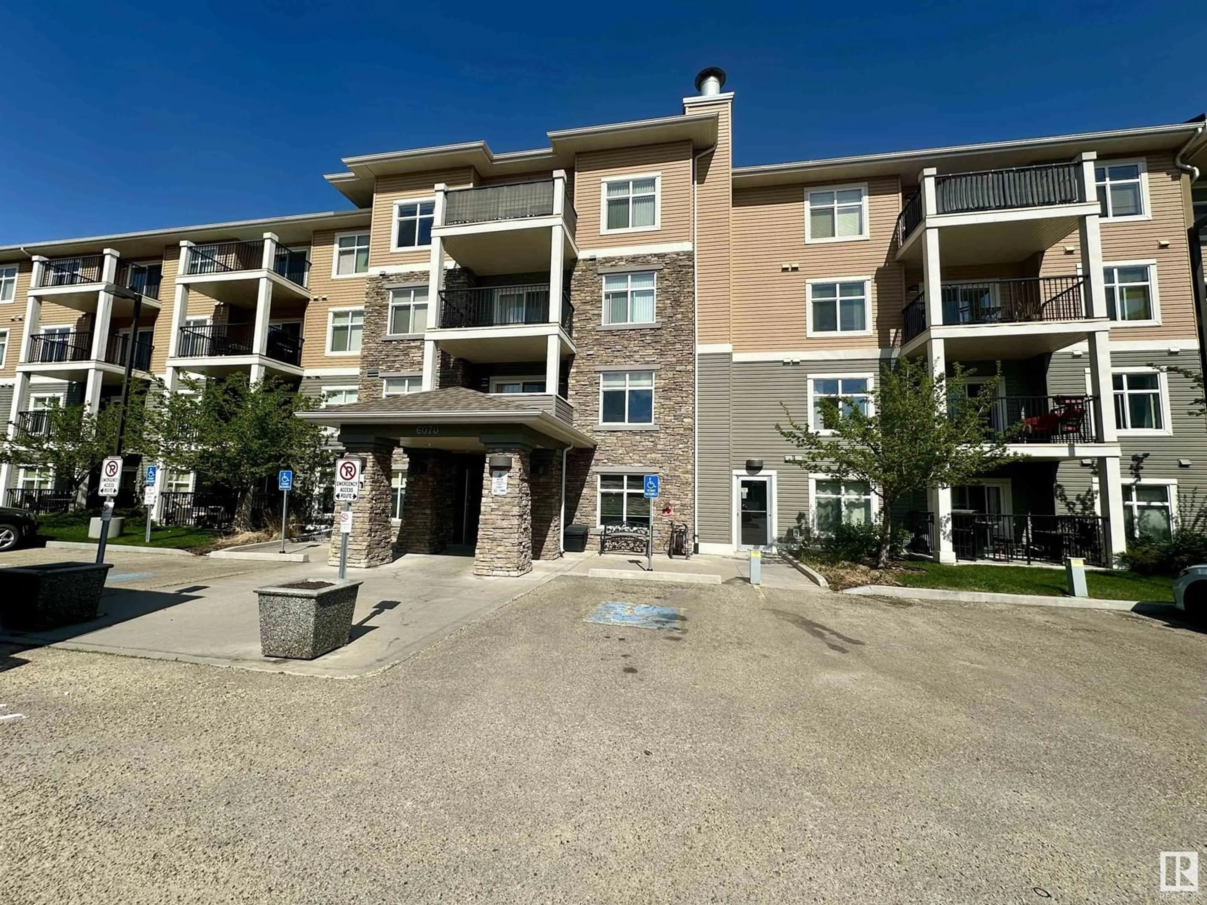 A pic from outside/outdoor area/front of a property/back of a property/a pic from drone, unknown for #209 - 6070 SCHONSEE WY, Edmonton Alberta T5Z0G8
