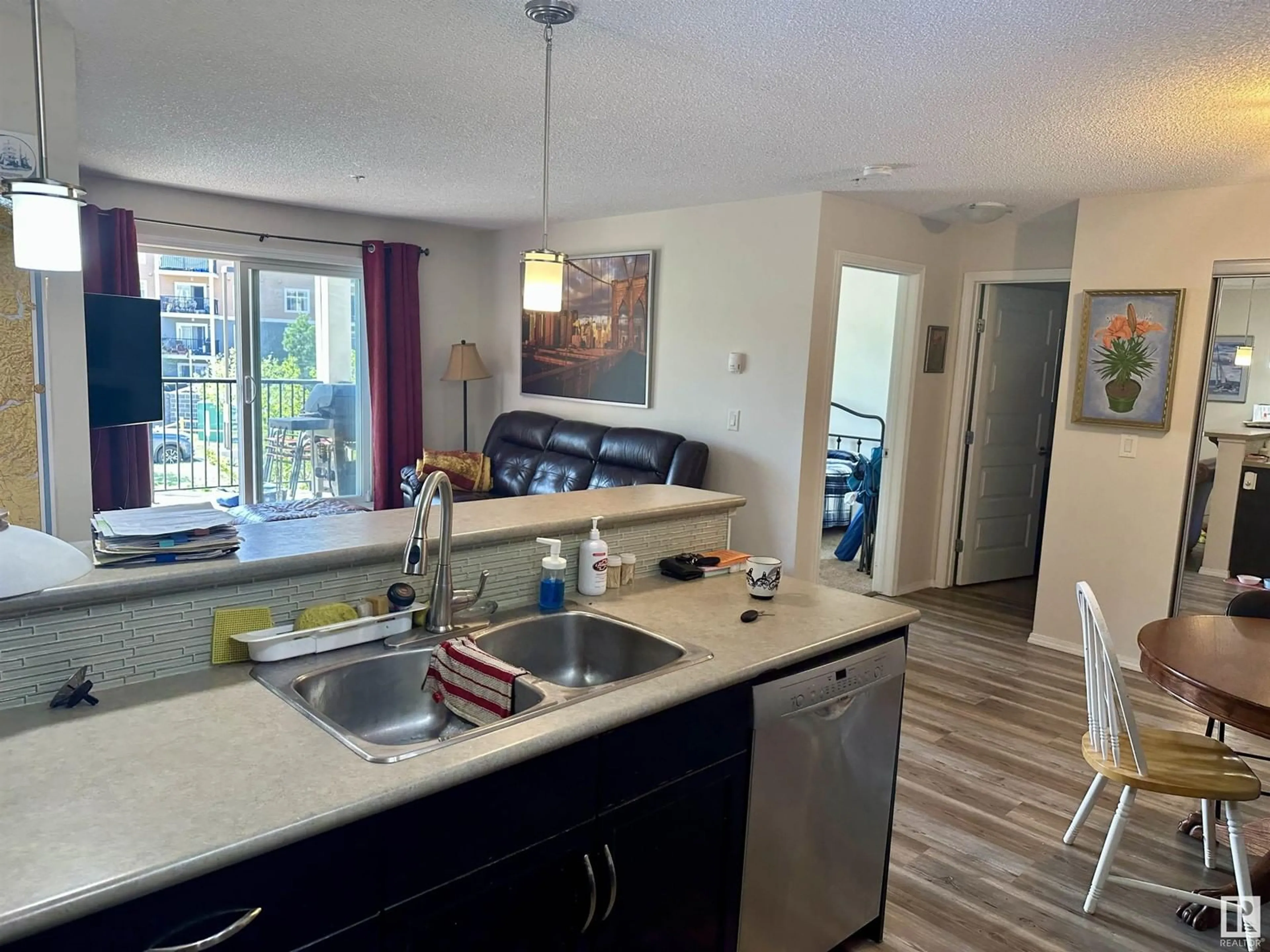 Open concept kitchen, unknown for #209 - 6070 SCHONSEE WY, Edmonton Alberta T5Z0G8