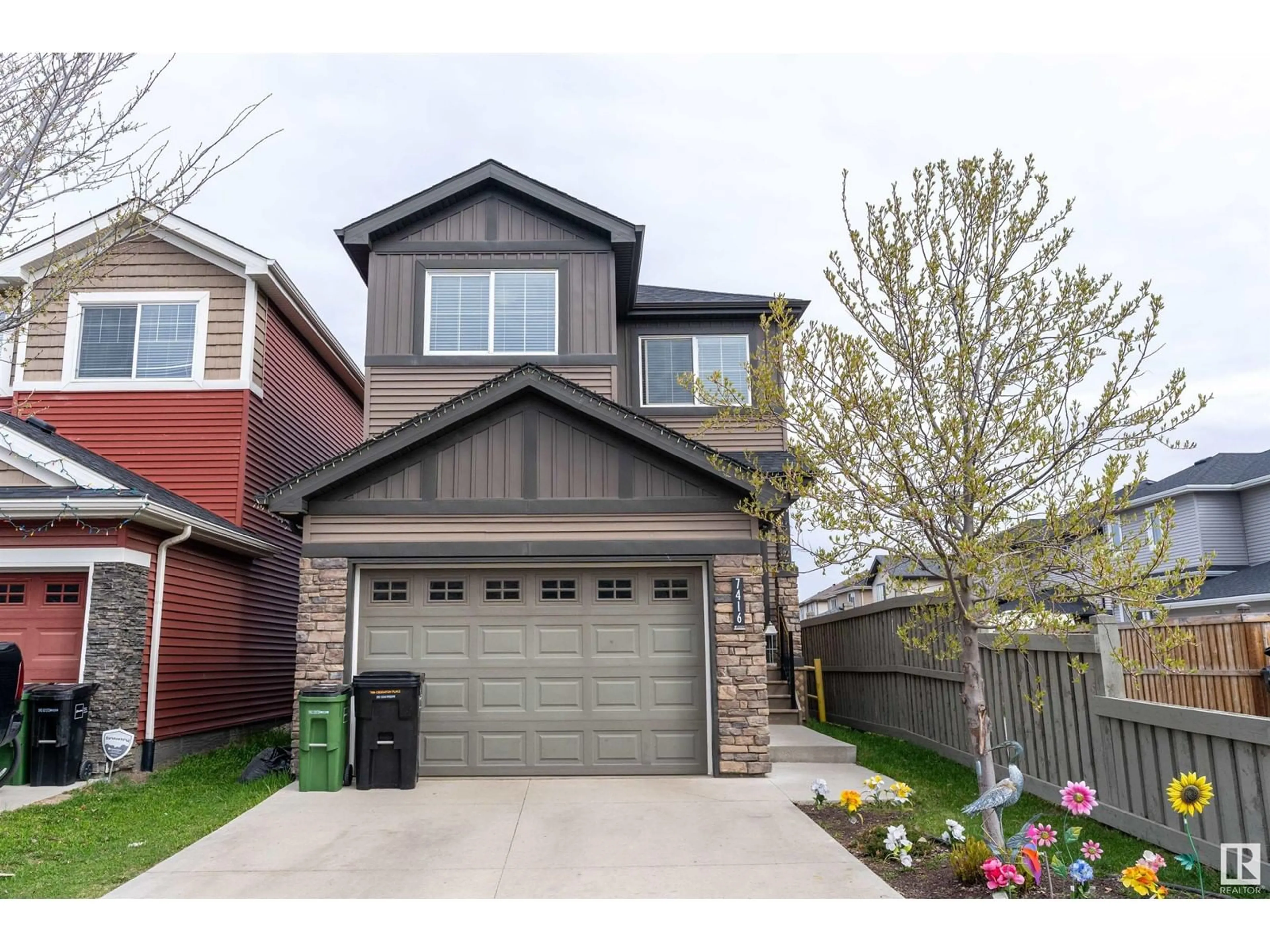 Home with vinyl exterior material, street for 7416 CREIGHTON PL, Edmonton Alberta T6W3Z4
