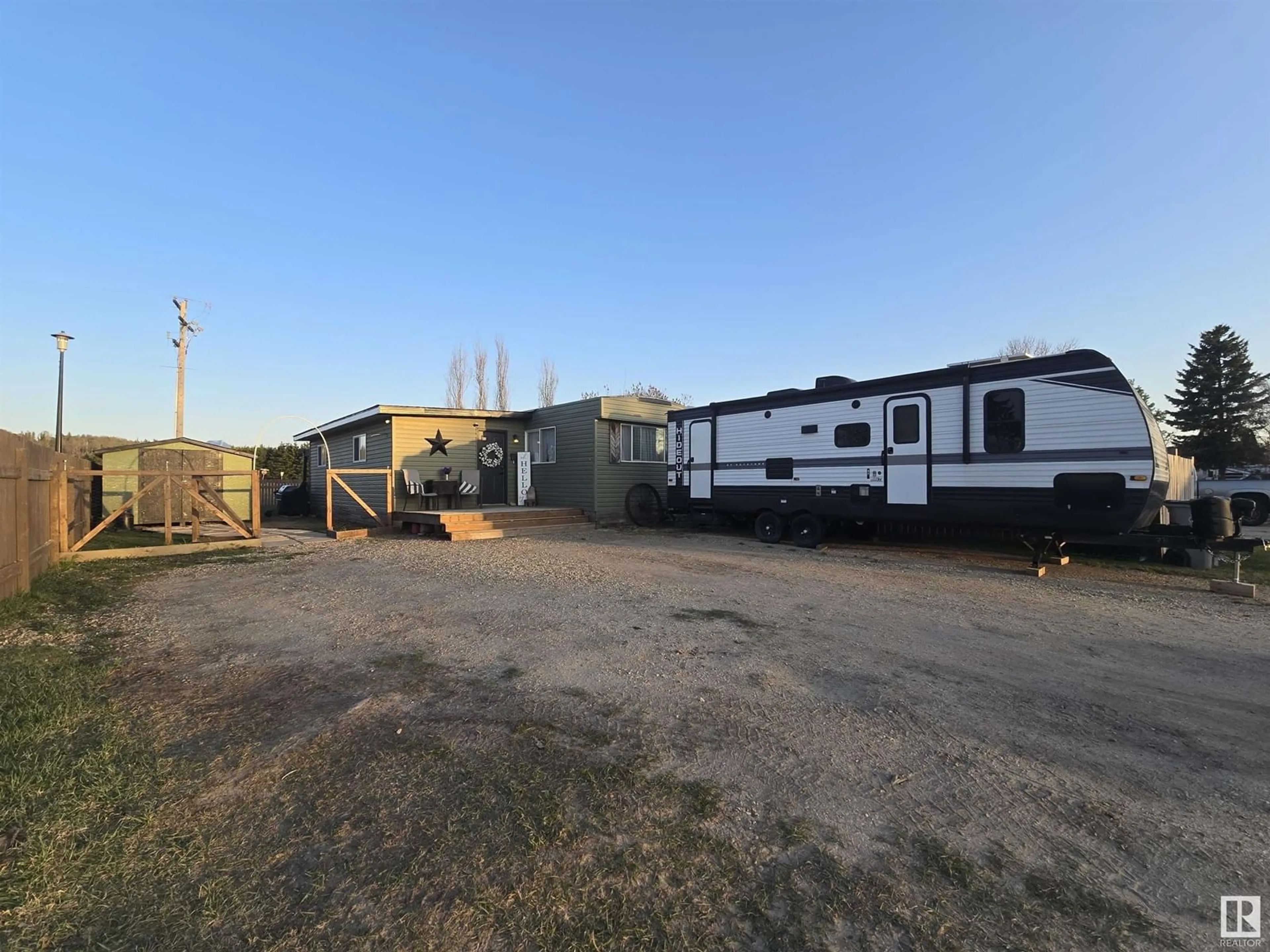 A pic from outside/outdoor area/front of a property/back of a property/a pic from drone, building for 45 RIVERSIDE TRAILER COURT, Whitecourt Alberta T7S1G6
