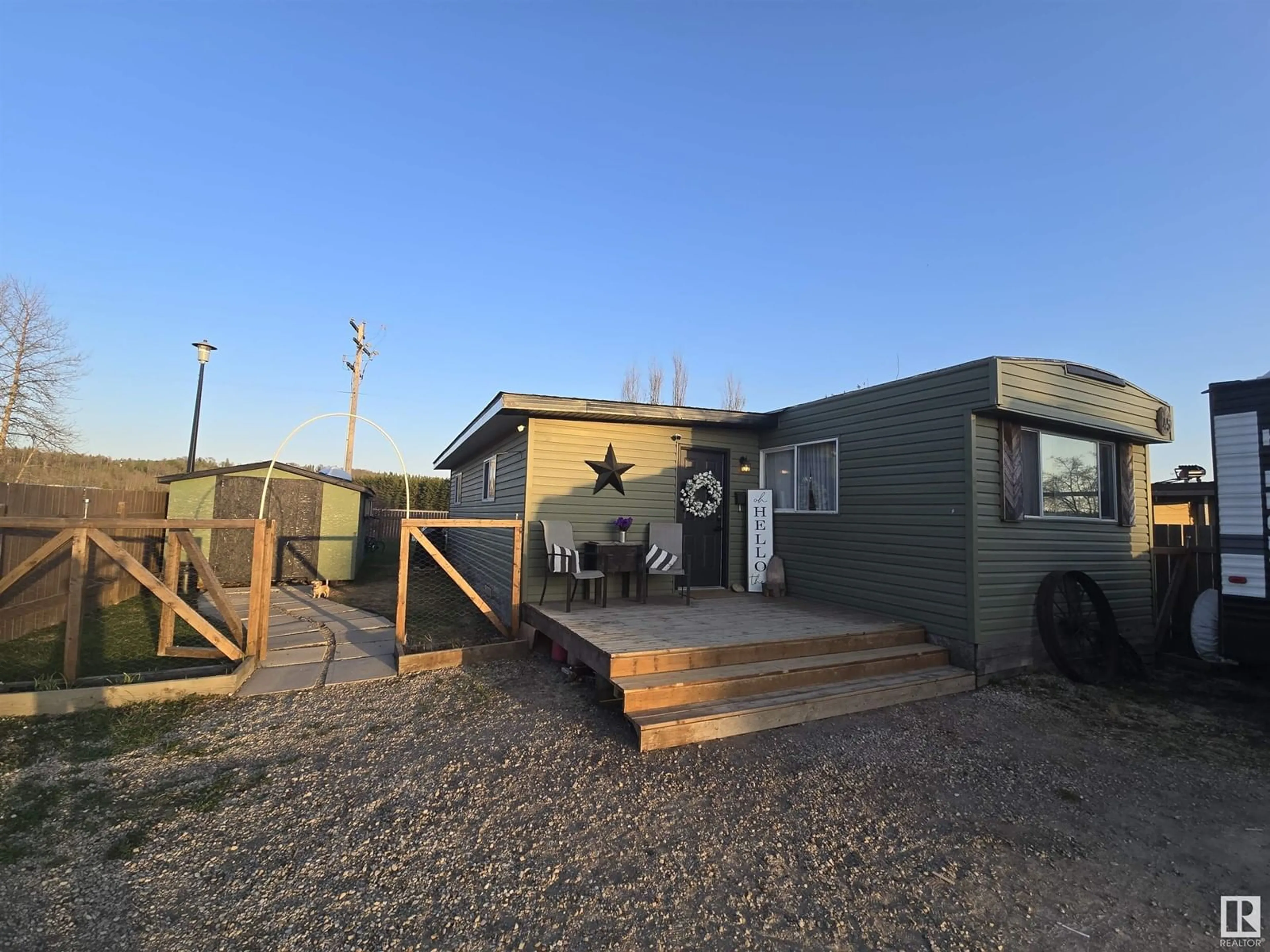 A pic from outside/outdoor area/front of a property/back of a property/a pic from drone, building for 45 RIVERSIDE TRAILER COURT, Whitecourt Alberta T7S1G6