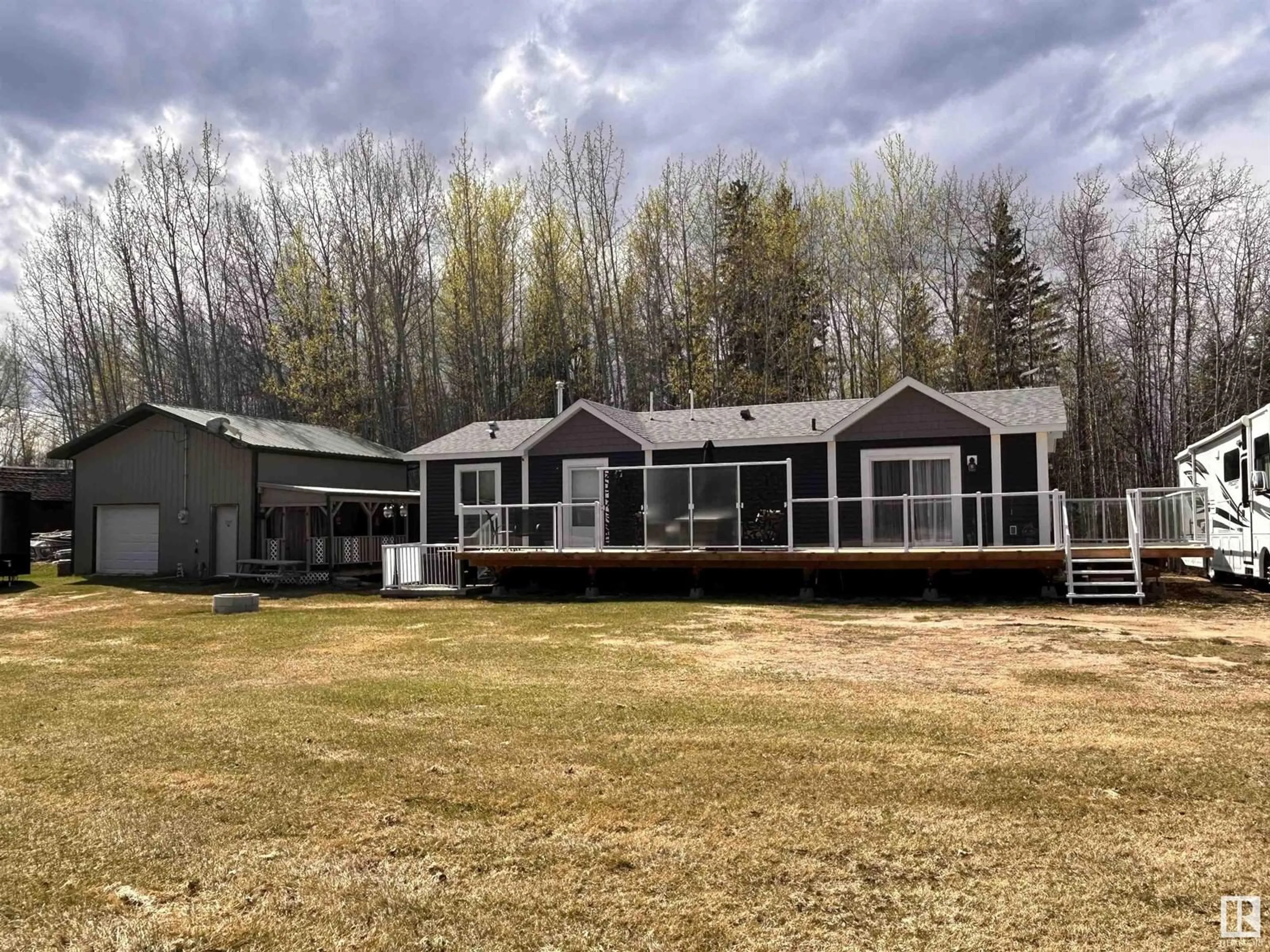 A pic from outside/outdoor area/front of a property/back of a property/a pic from drone, unknown for 20001 TWP RD 661, Flatbush Alberta T0G0Z0