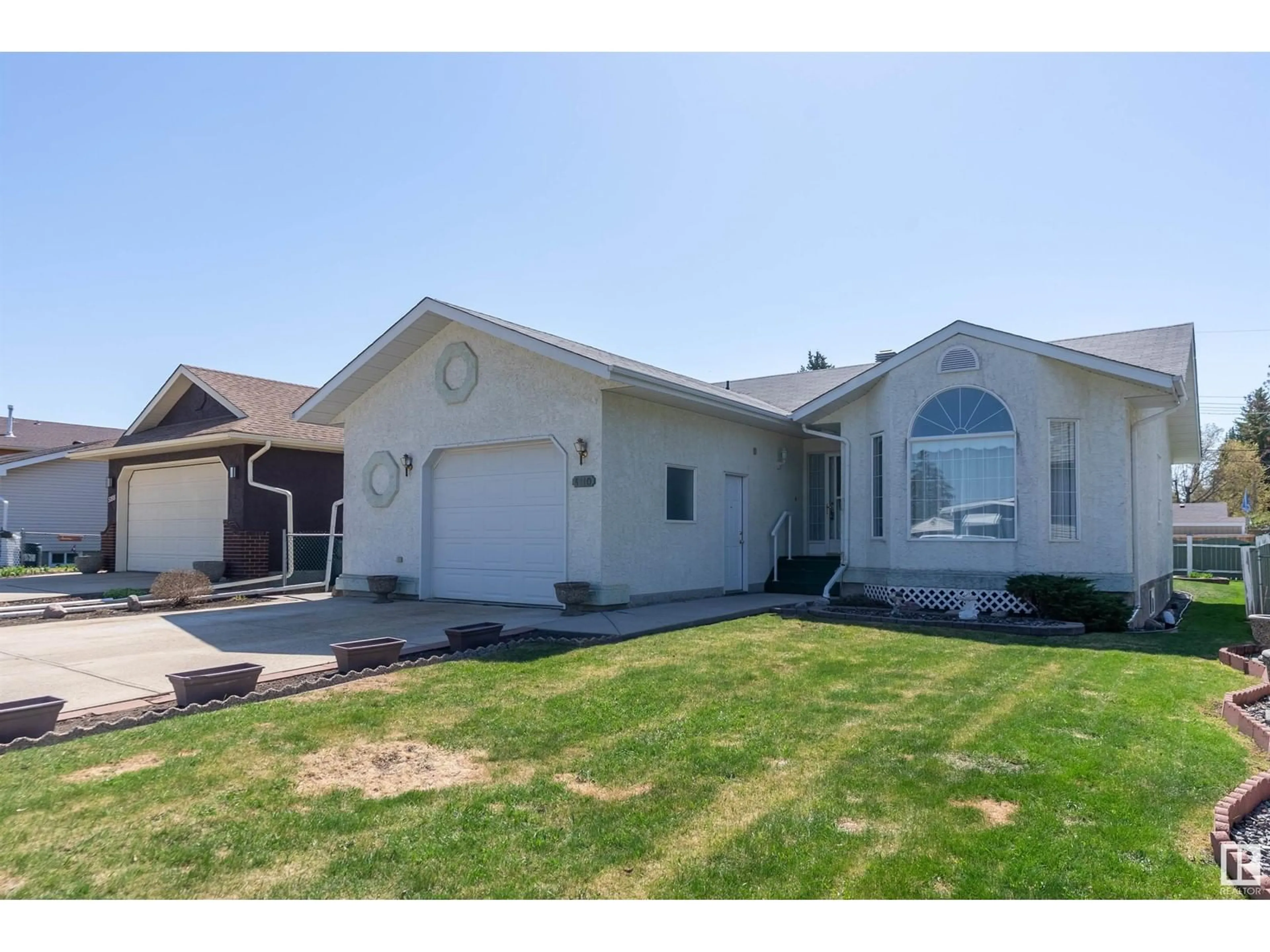 Home with vinyl exterior material, street for 5110 51 AV, Stony Plain Alberta T7Z1C2