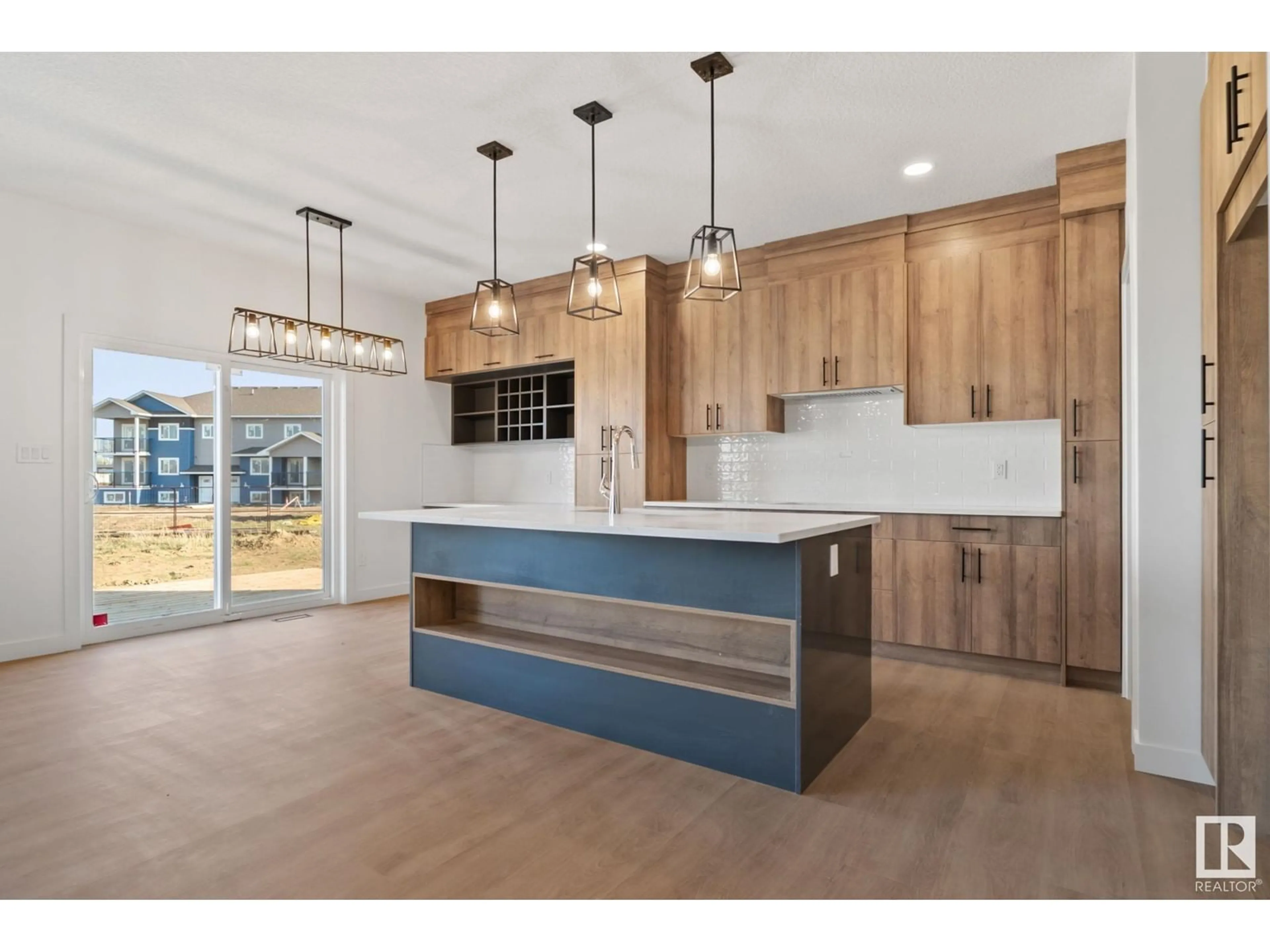 Open concept kitchen, wood/laminate floor for 36 SUN MEADOWS CL, Stony Plain Alberta T7Z0K1