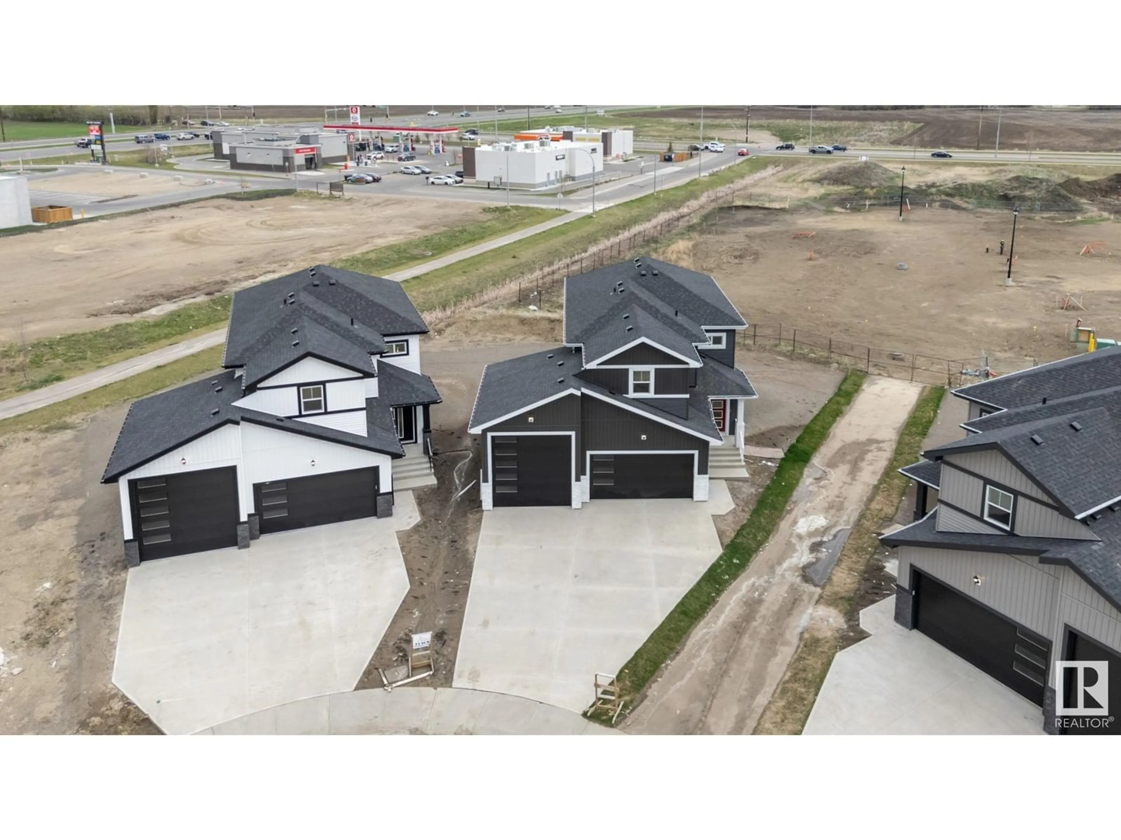 A pic from outside/outdoor area/front of a property/back of a property/a pic from drone, street for 34 SUN MEADOWS CL, Stony Plain Alberta T7Z0K1