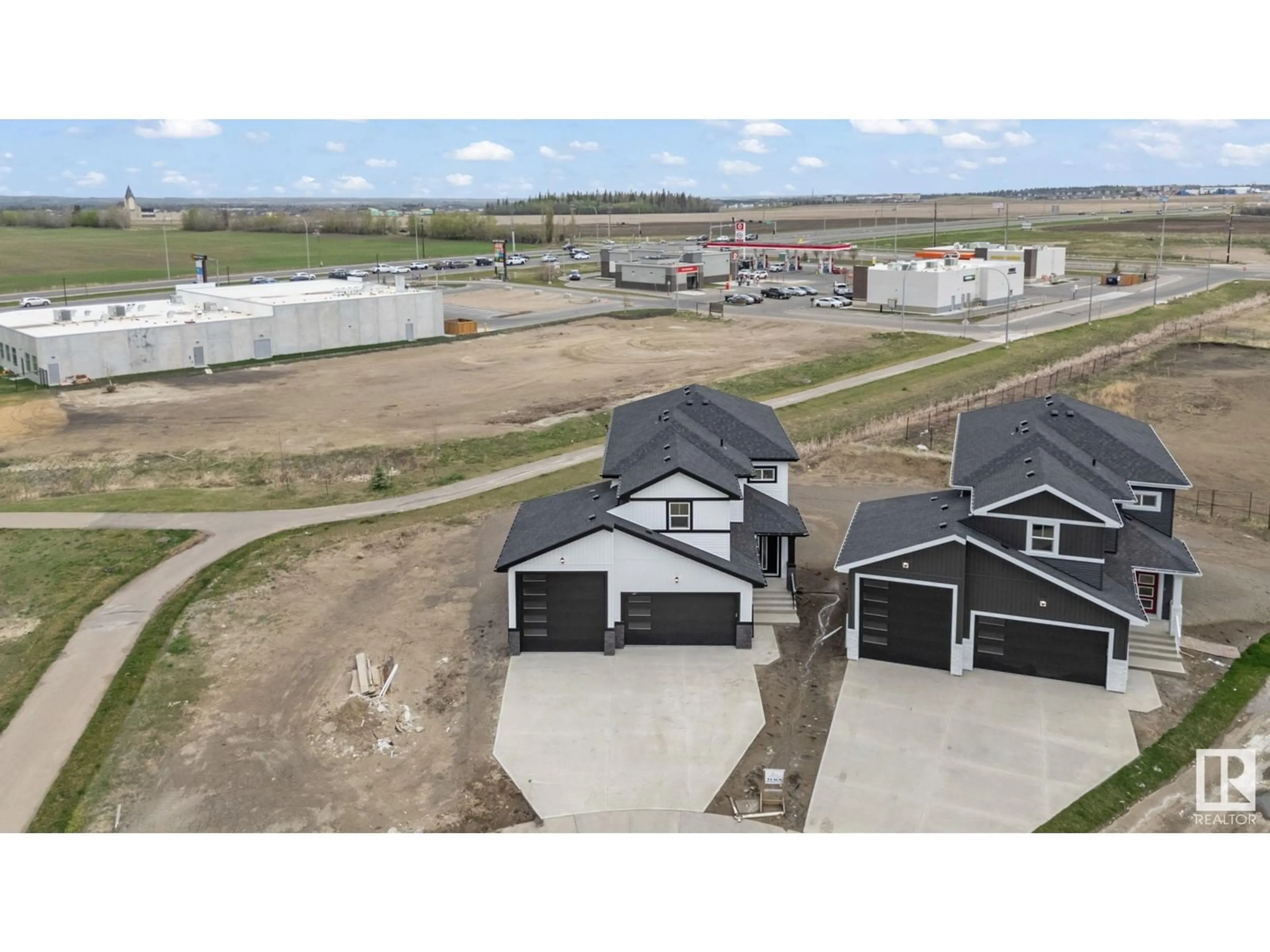 A pic from outside/outdoor area/front of a property/back of a property/a pic from drone, unknown for 33 SUN MEADOWS CL, Stony Plain Alberta T7Z0K1