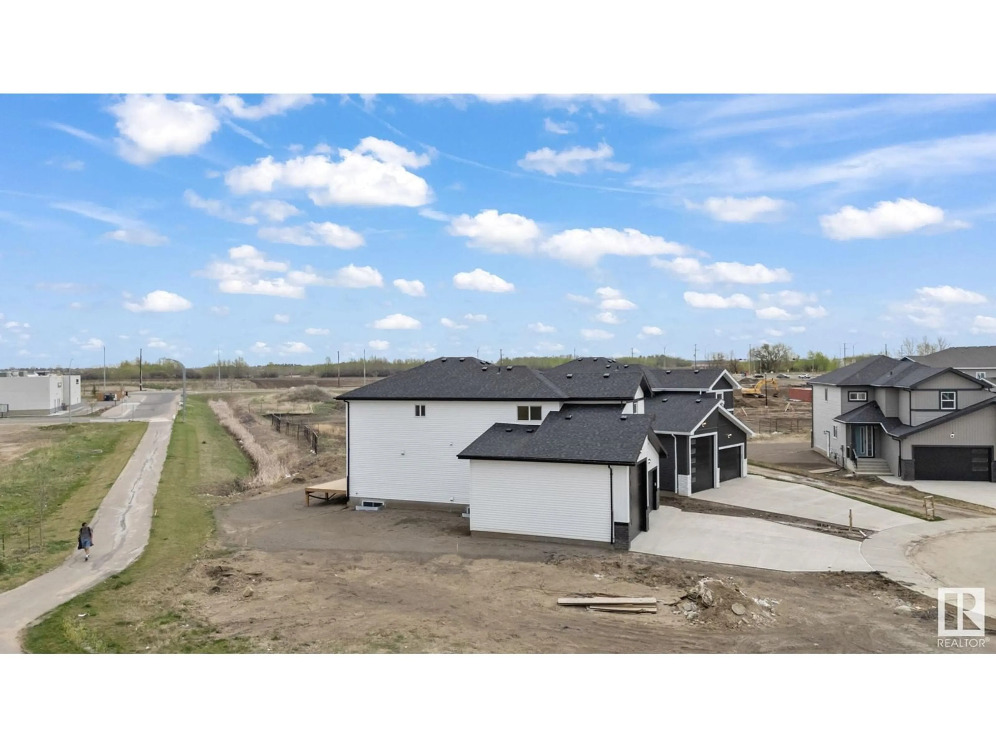 A pic from outside/outdoor area/front of a property/back of a property/a pic from drone, building for 33 SUN MEADOWS CL, Stony Plain Alberta T7Z0K1