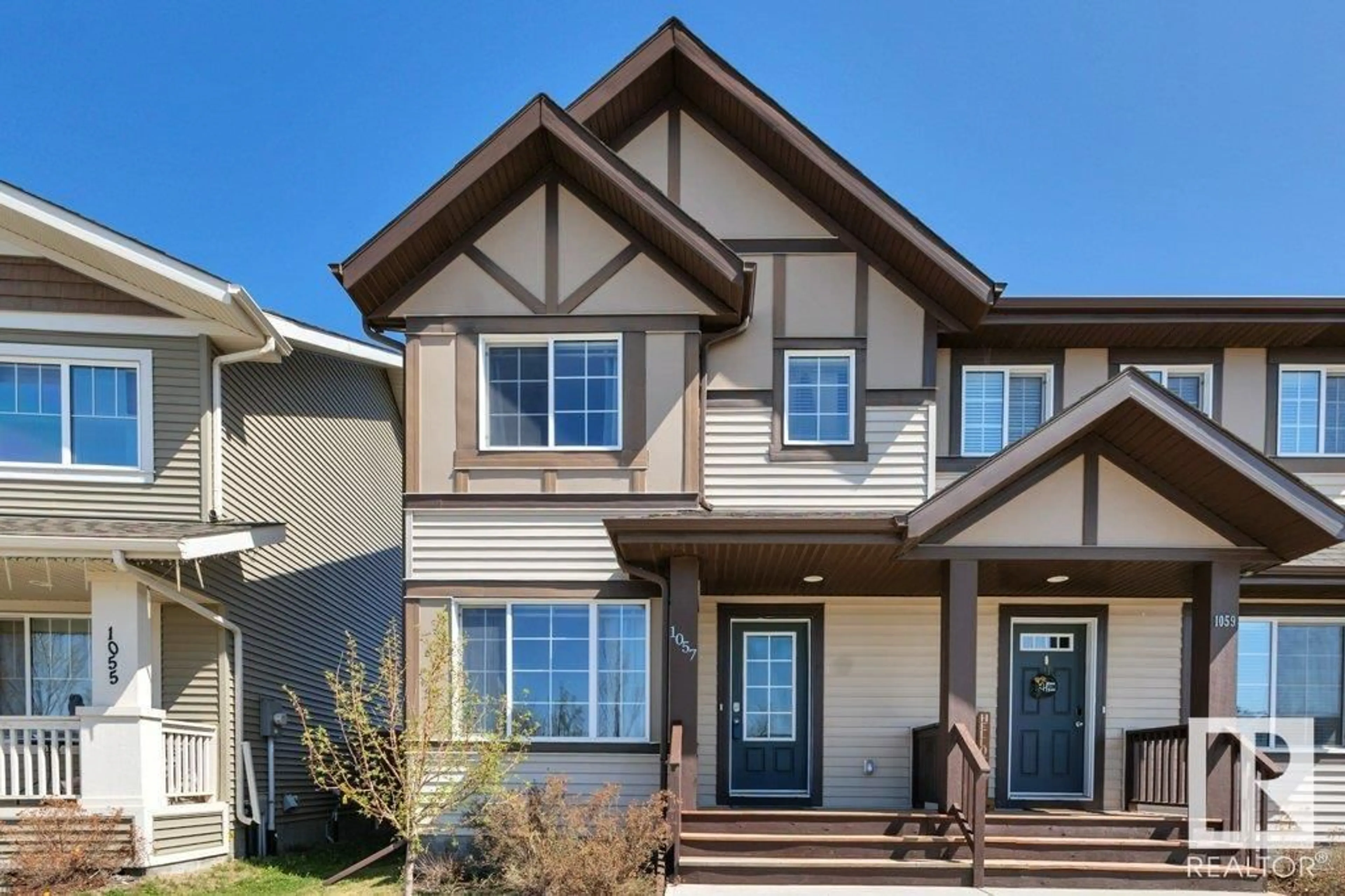 Home with vinyl exterior material, street for 1057 PAISLEY DR, Edmonton Alberta T6W4E1
