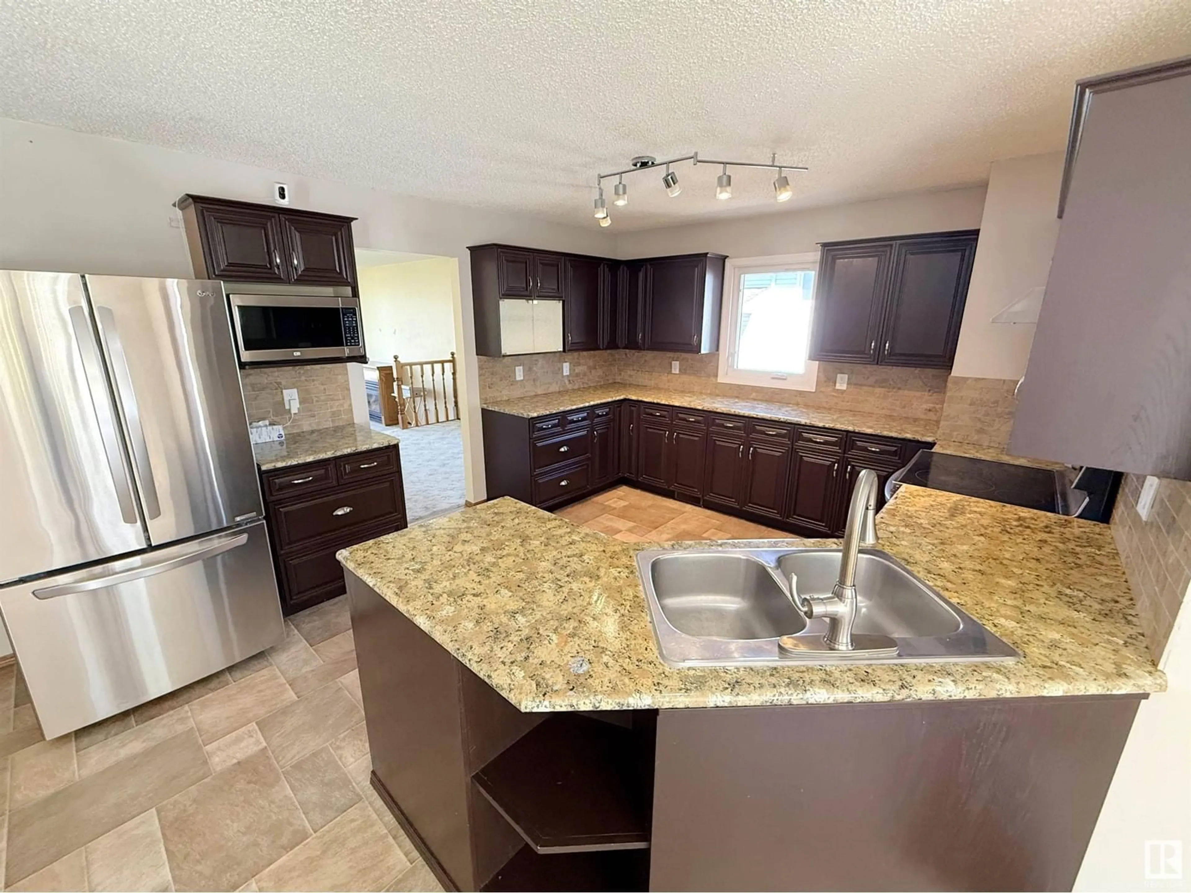 Open concept kitchen, ceramic/tile floor for 30 WINDERMERE DR, Spruce Grove Alberta T7X1P7