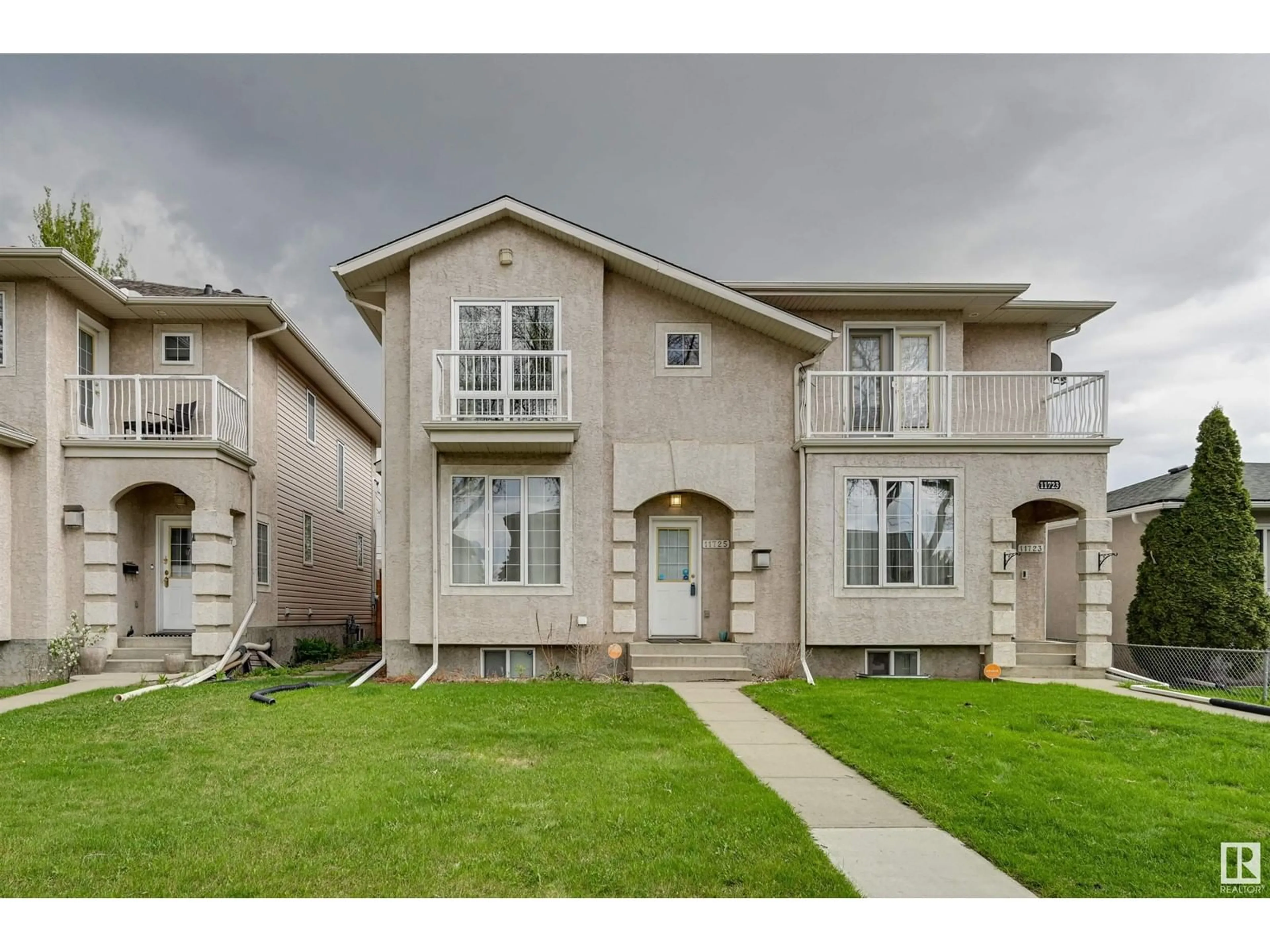 Home with vinyl exterior material, street for NW - 11725 122 ST, Edmonton Alberta T5M0B6