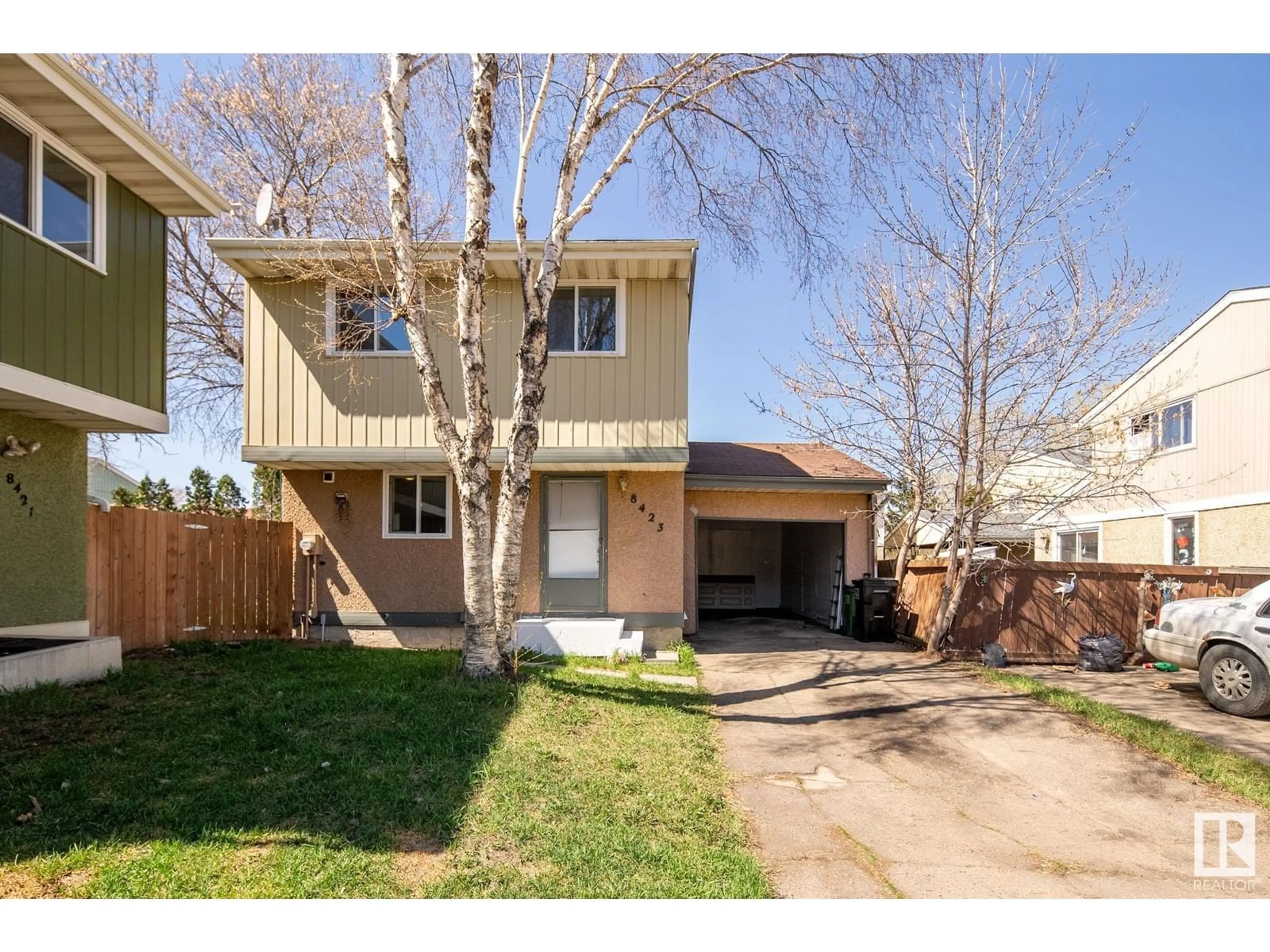 Home with vinyl exterior material, street for 8423 MILL WOODS RD, Edmonton Alberta T6K2P6