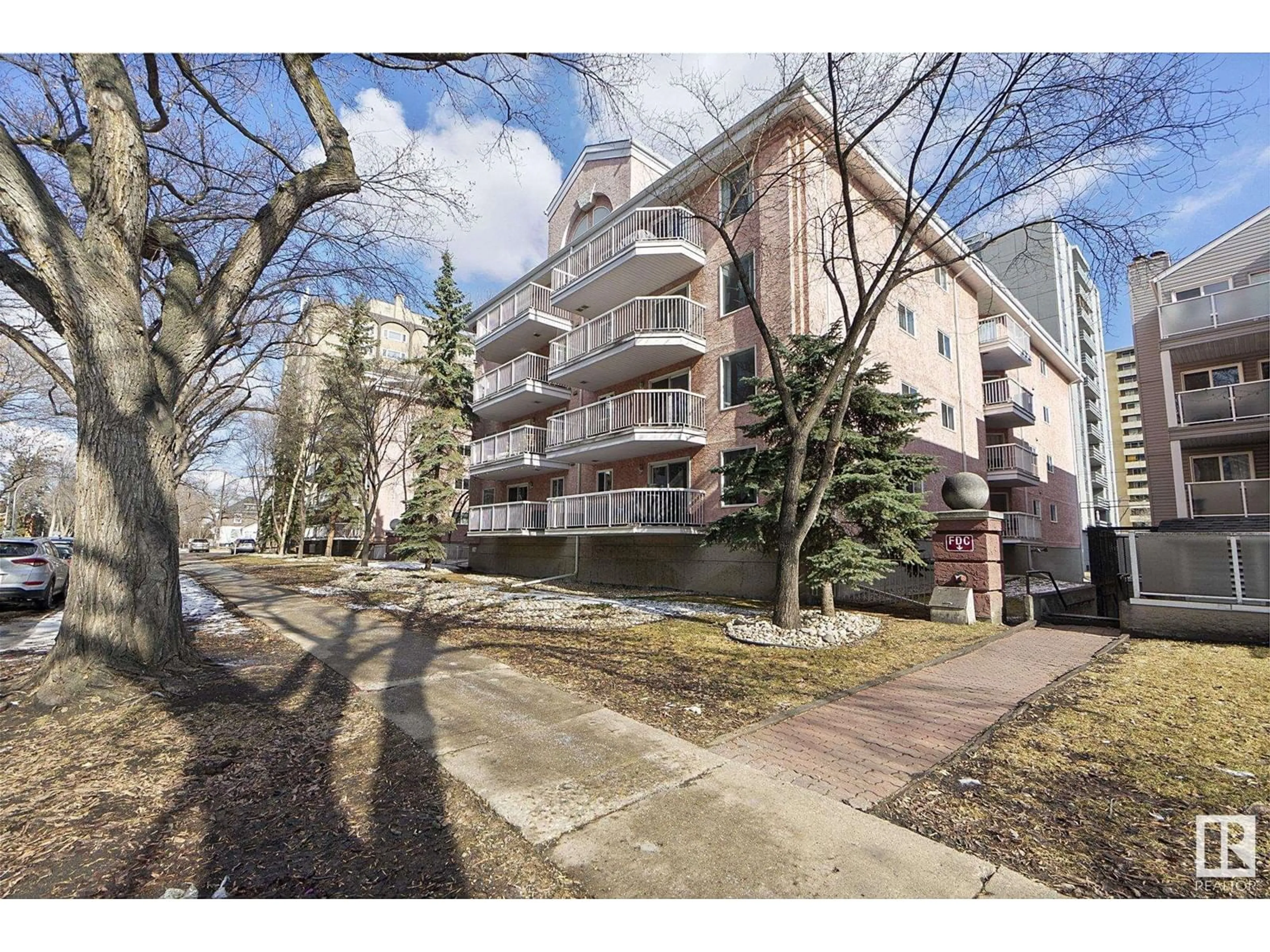 A pic from outside/outdoor area/front of a property/back of a property/a pic from drone, street for #104 - 10153 117 ST, Edmonton Alberta T5K1X5