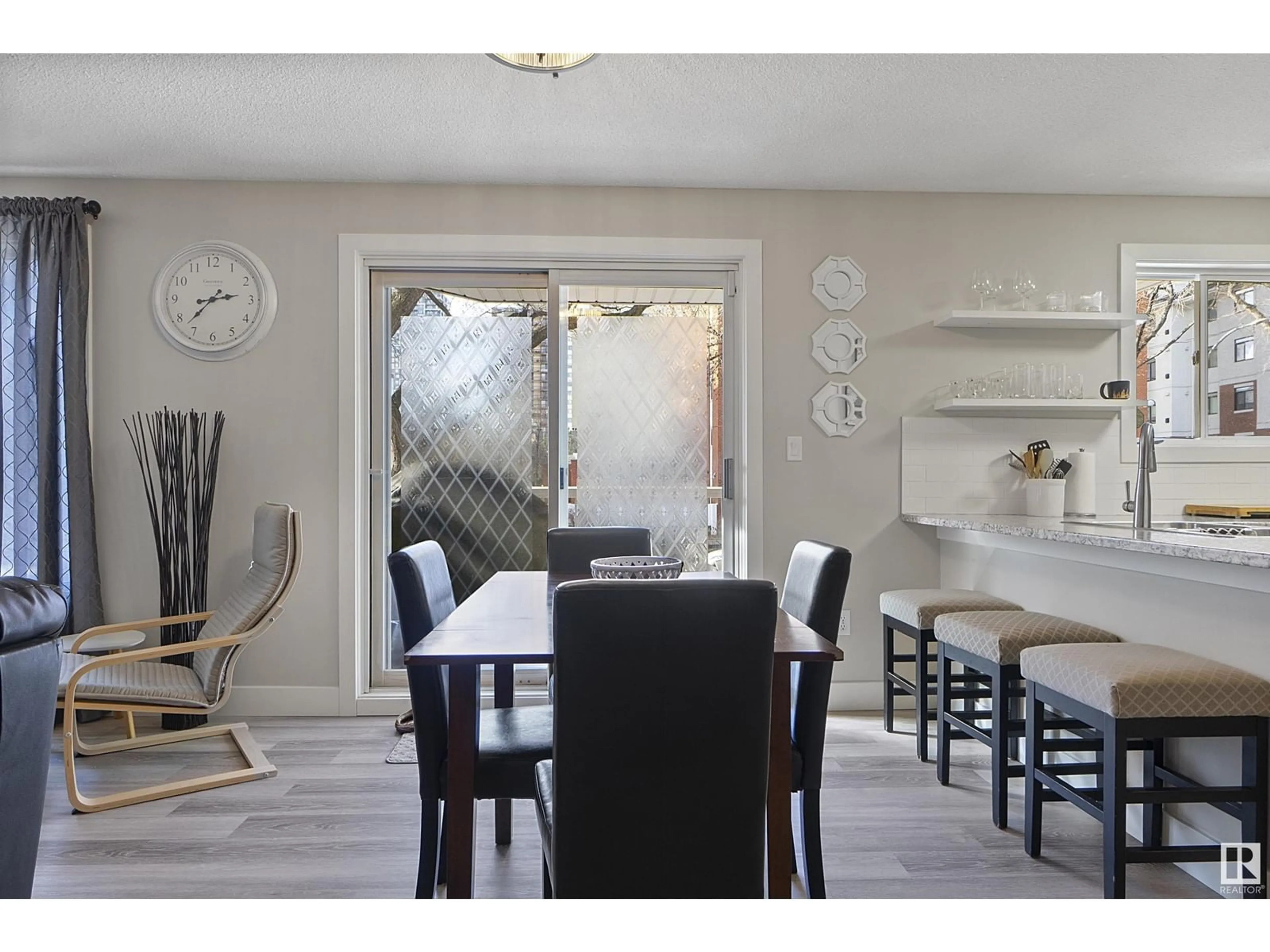 Dining room, wood/laminate floor for #104 - 10153 117 ST, Edmonton Alberta T5K1X5