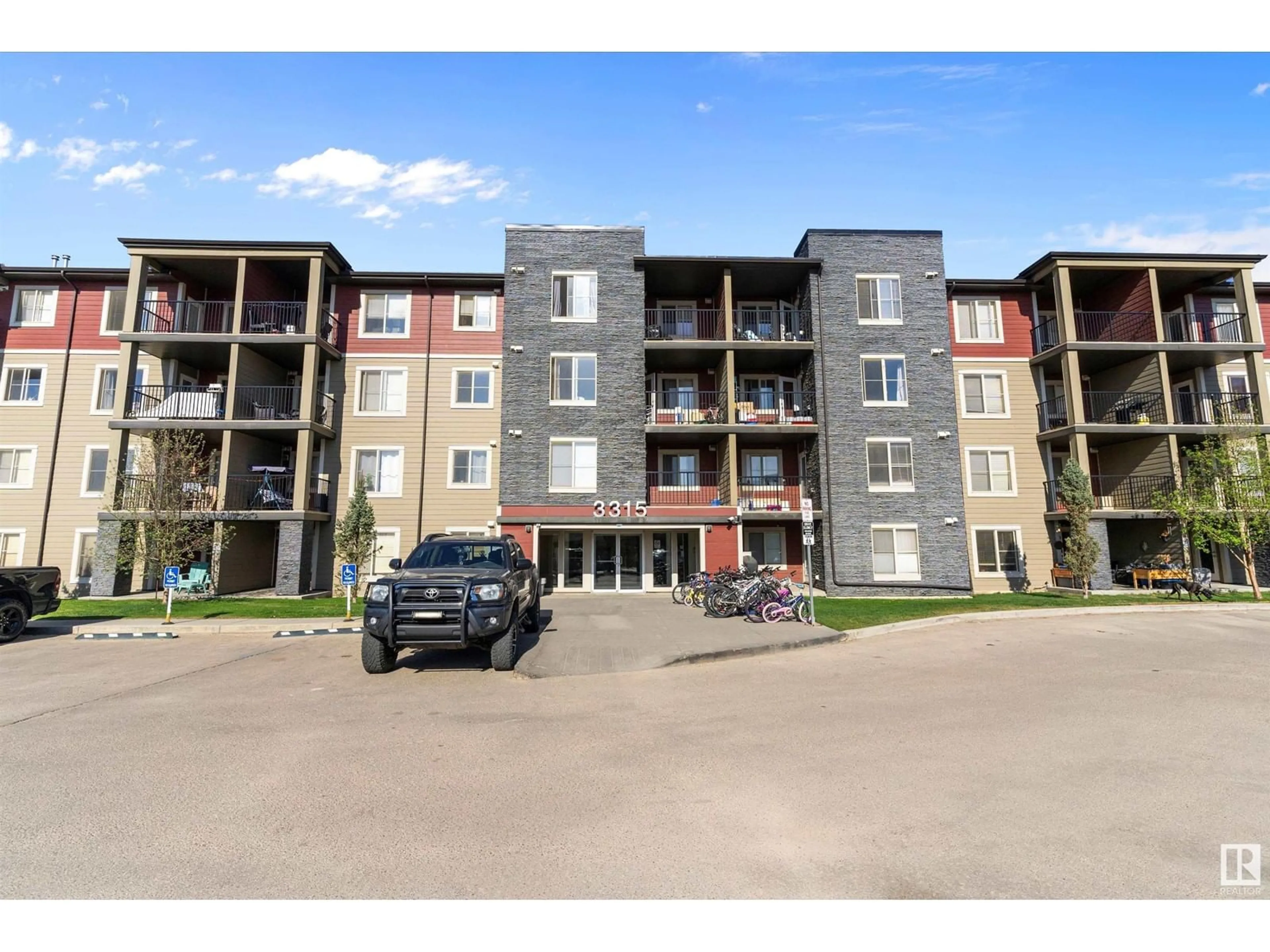 A pic from outside/outdoor area/front of a property/back of a property/a pic from drone, building for #221 - 3315 JAMES MOWATT TR, Edmonton Alberta T6W3L6