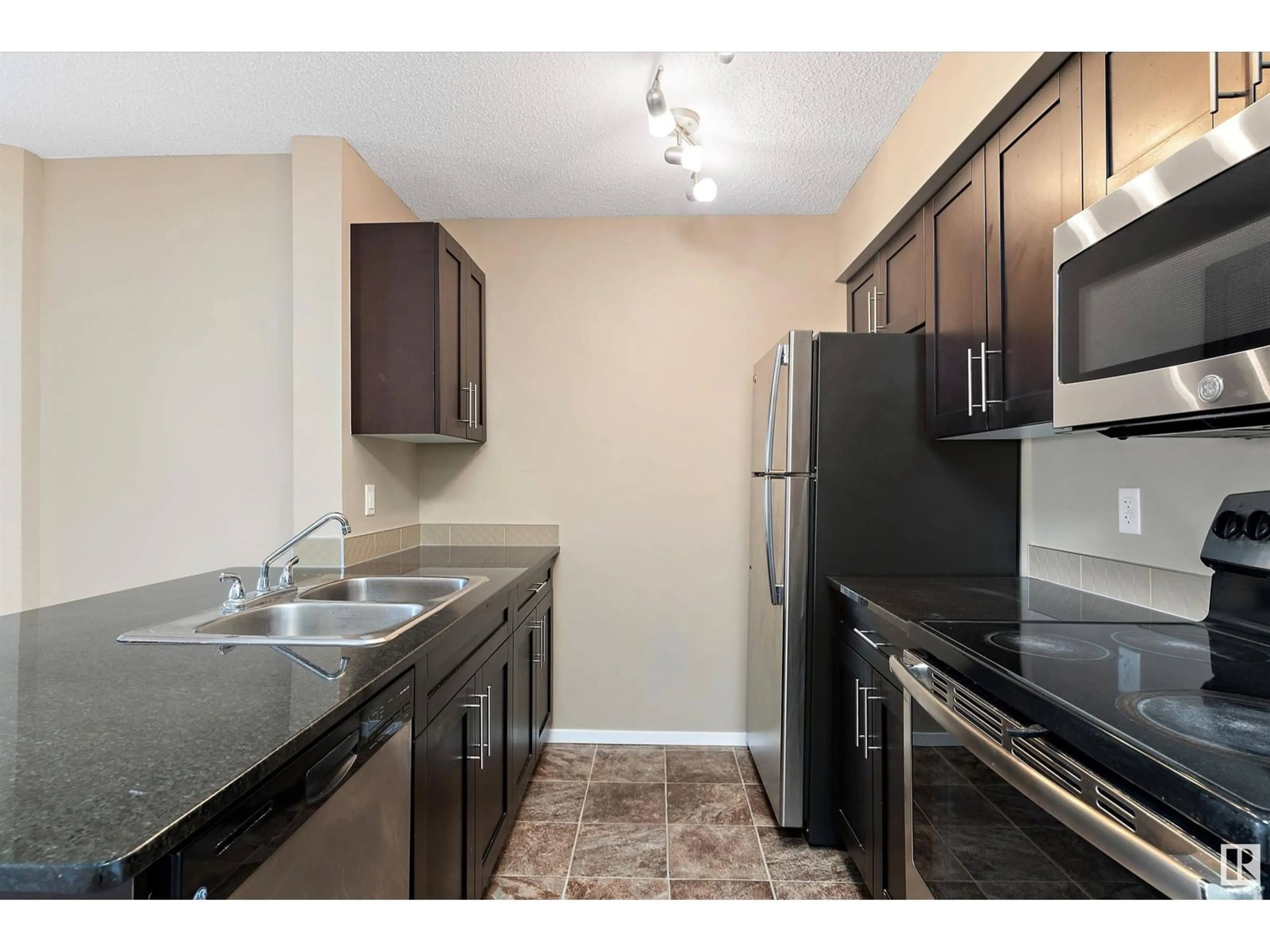 Standard kitchen, unknown for #221 - 3315 JAMES MOWATT TR, Edmonton Alberta T6W3L6