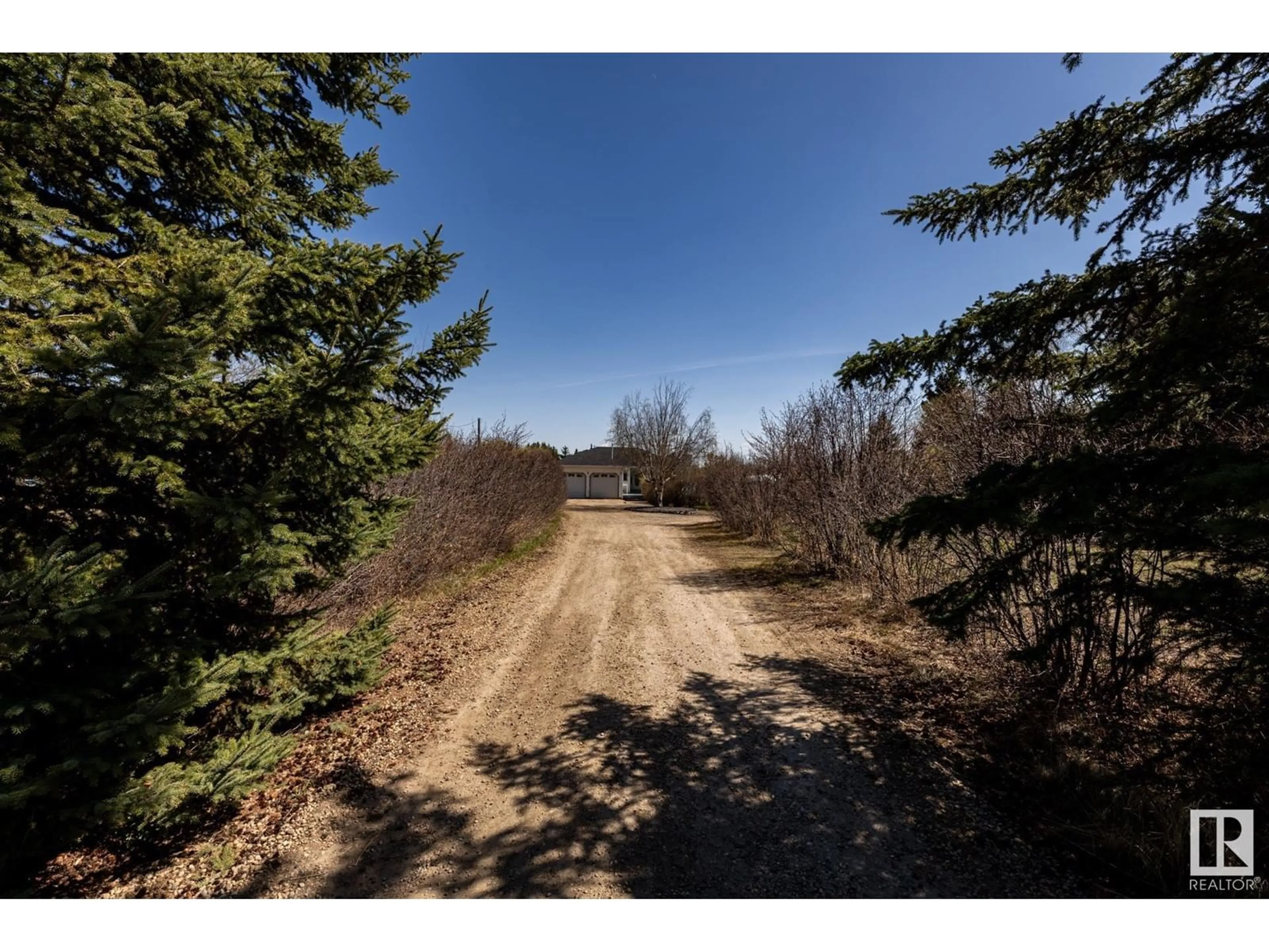 A pic from outside/outdoor area/front of a property/back of a property/a pic from drone, forest/trees view for 19 55312 RGE ROAD 241, Rural Sturgeon County Alberta T8T1X6
