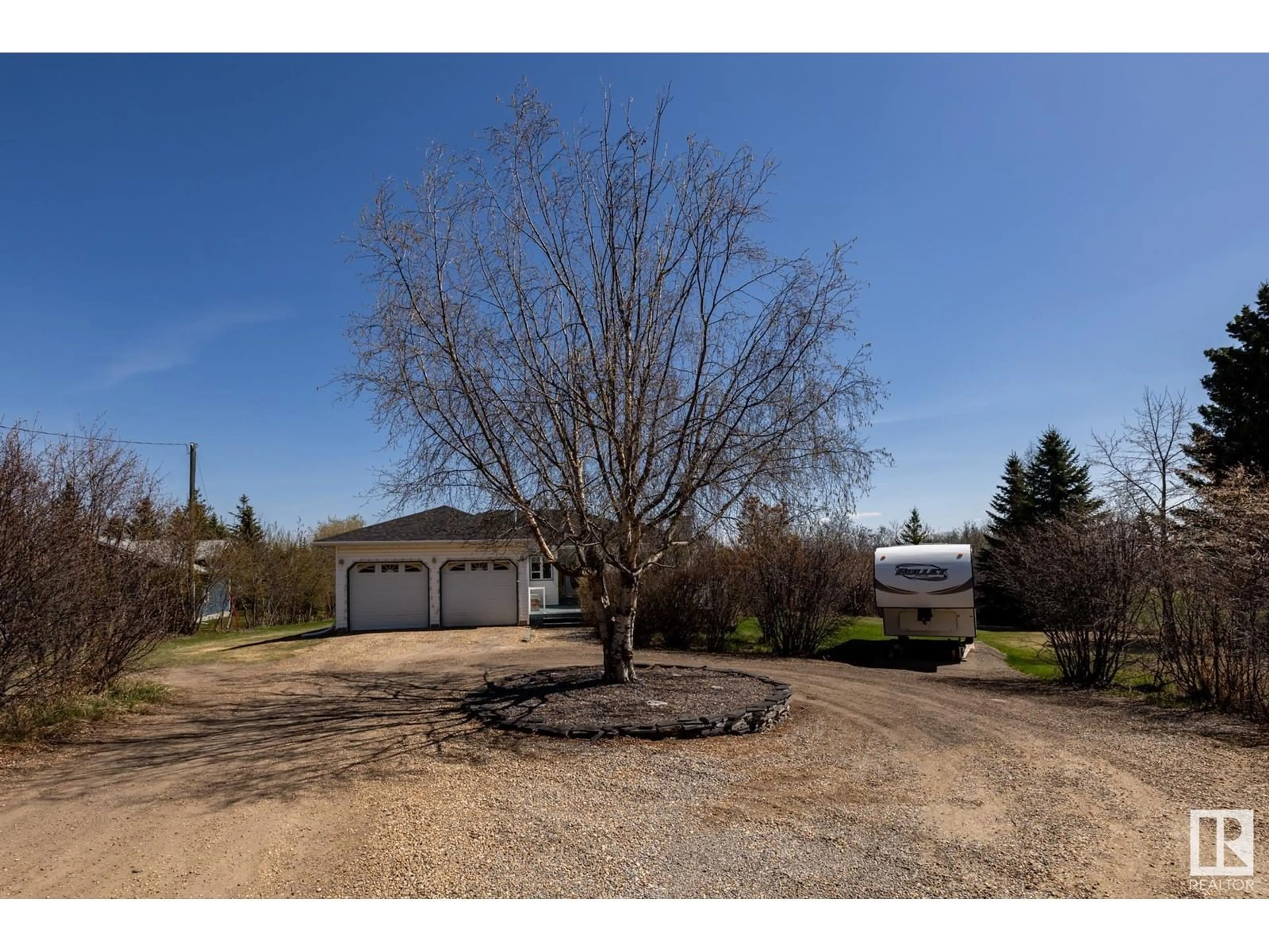 A pic from outside/outdoor area/front of a property/back of a property/a pic from drone, unknown for 19 55312 RGE ROAD 241, Rural Sturgeon County Alberta T8T1X6