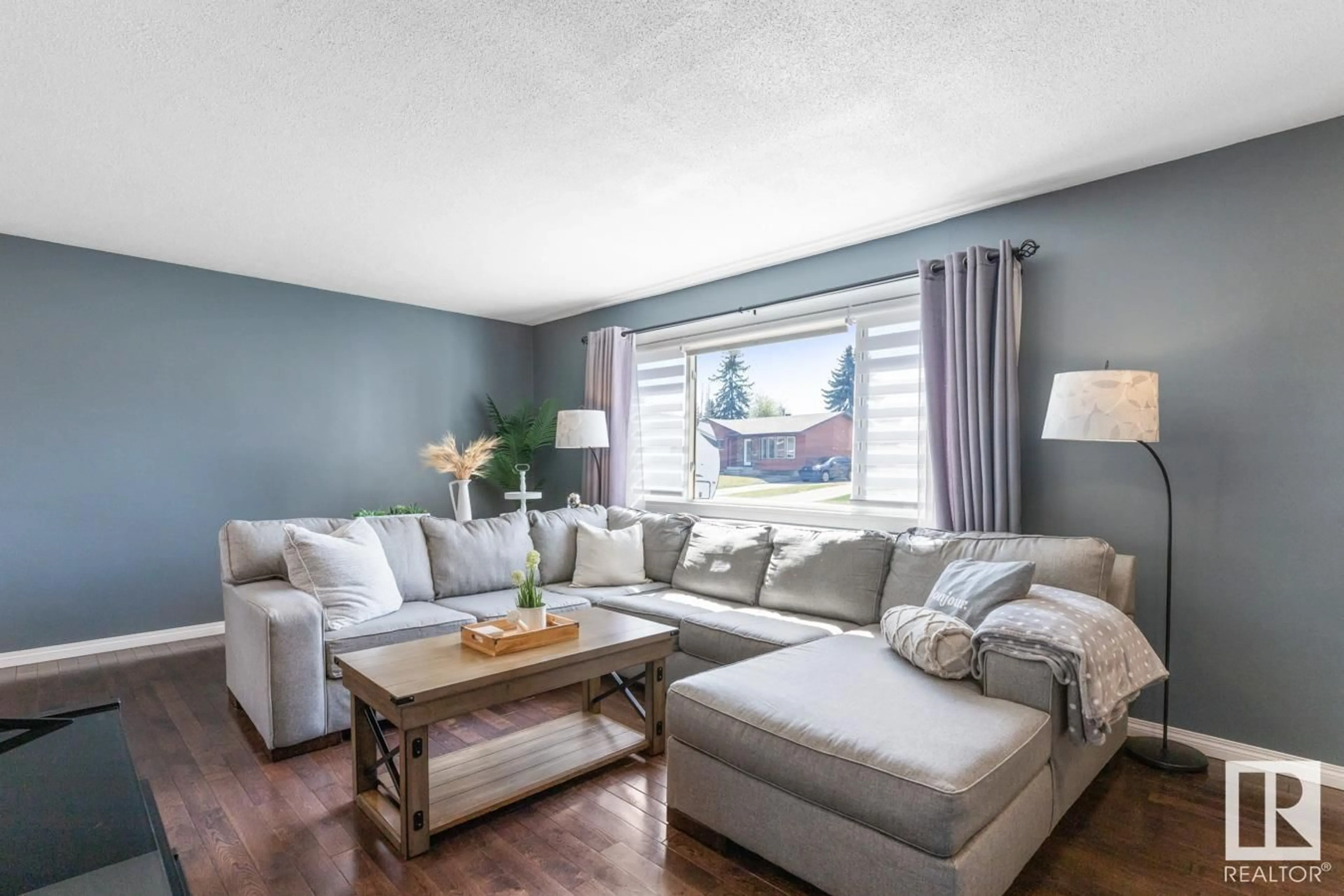 Living room with furniture, wood/laminate floor for 15 MELROSE CR, Sherwood Park Alberta T8A3T9