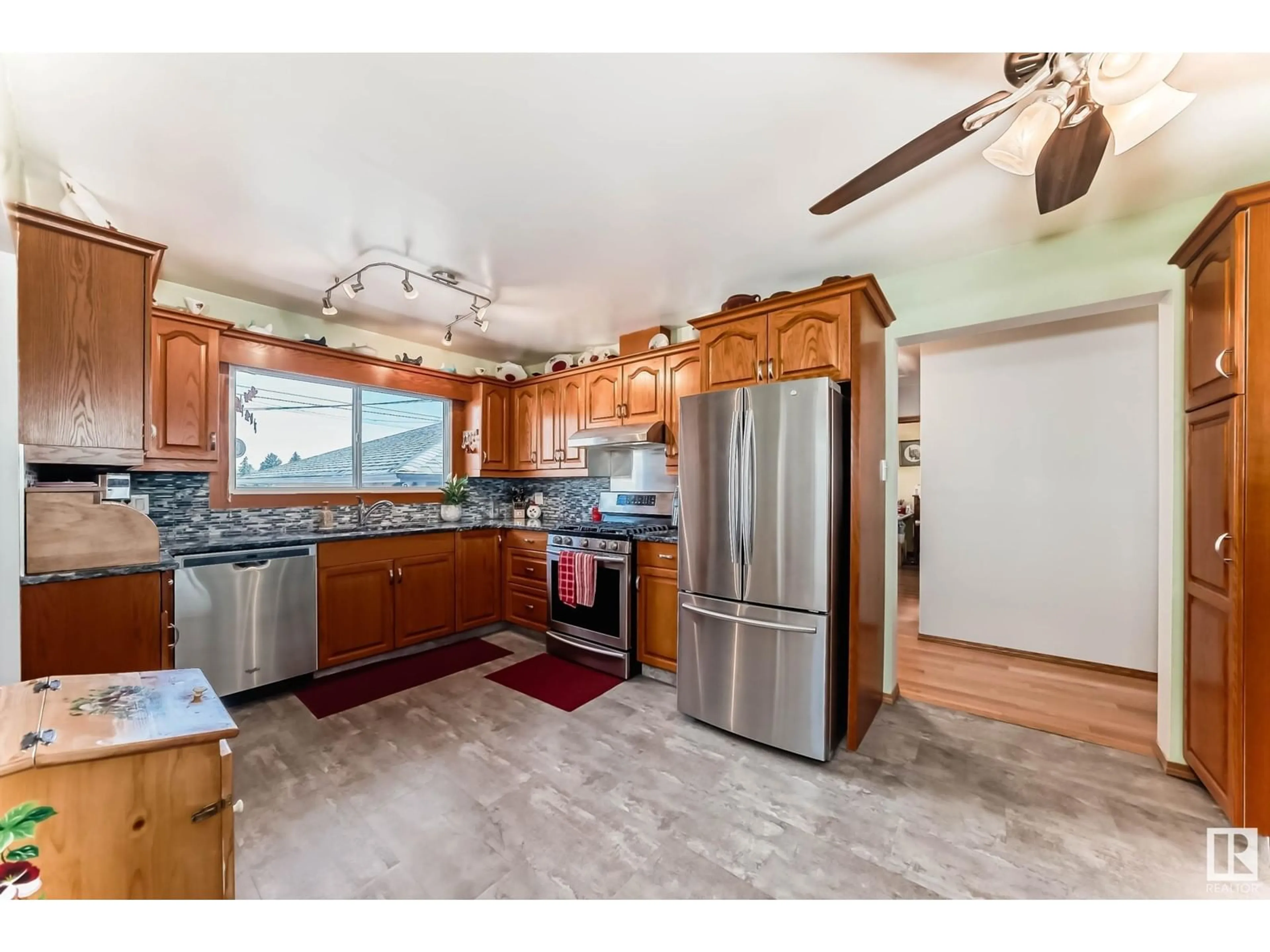 Open concept kitchen, unknown for 6916 98A AV, Edmonton Alberta T6A0C1