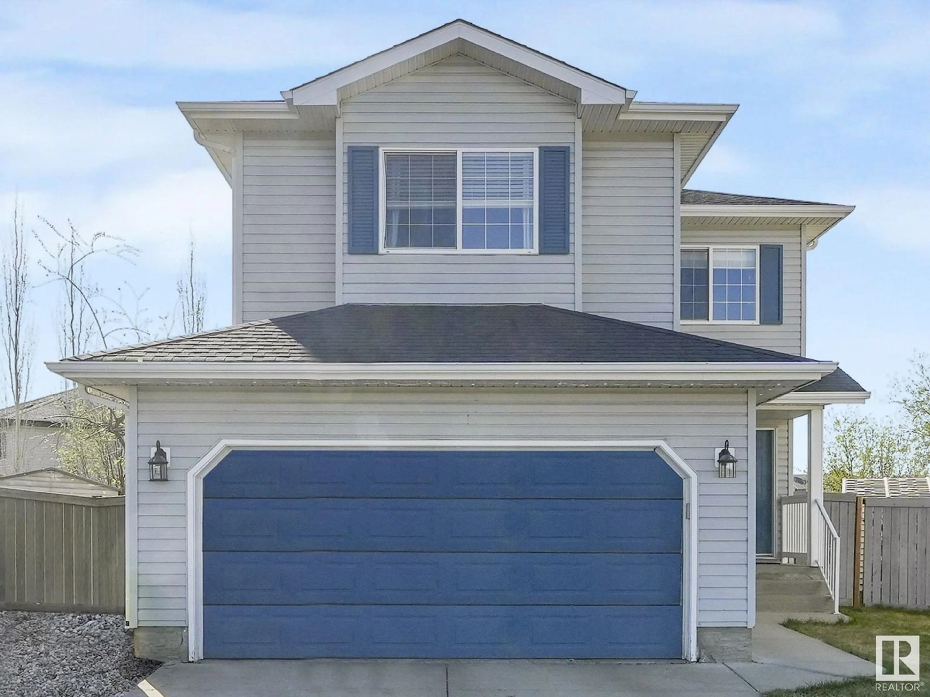 Home with vinyl exterior material, street for 3250 23 ST, Edmonton Alberta T6T2A8