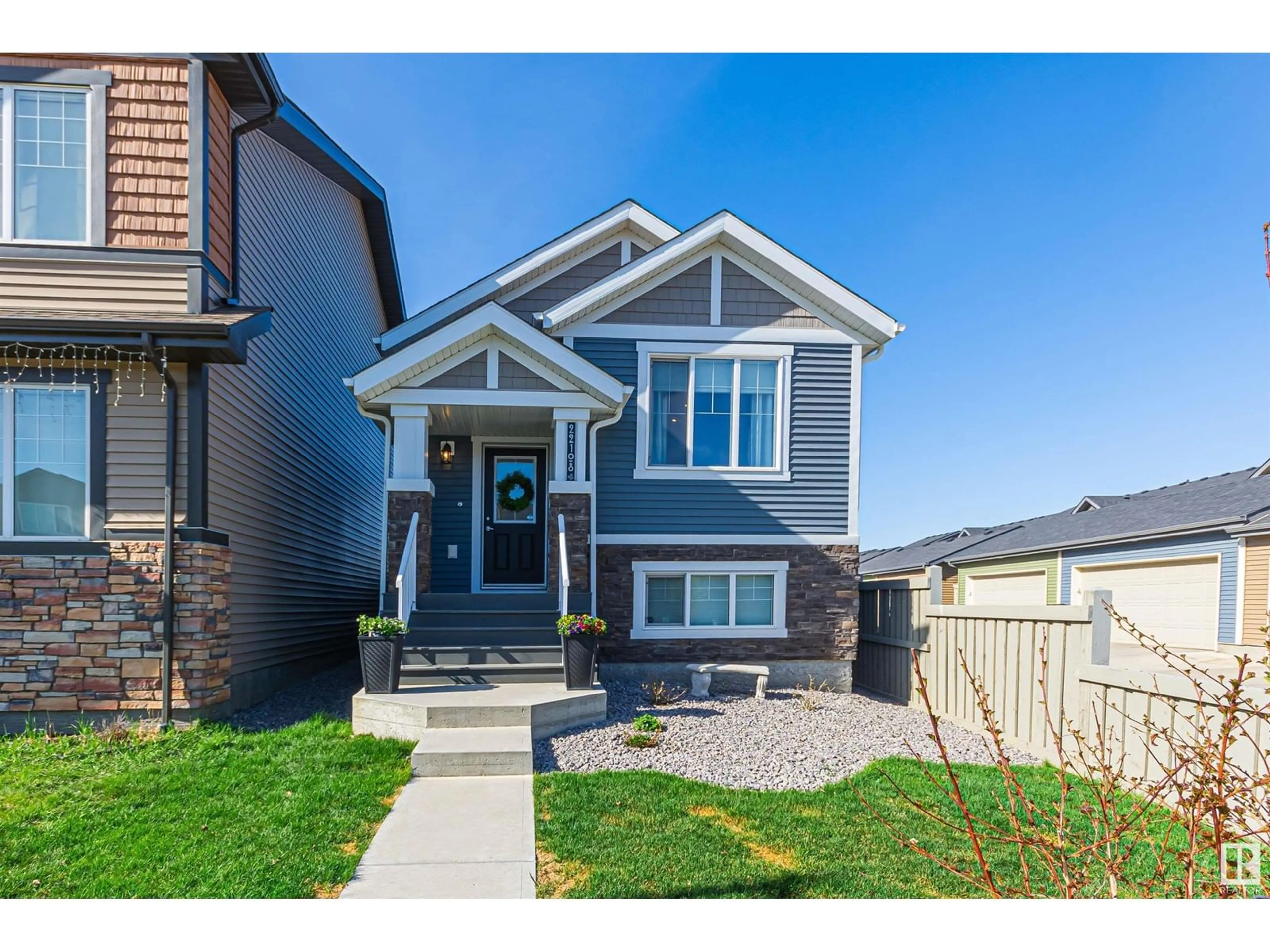 Home with vinyl exterior material, street for 22108 85 AV, Edmonton Alberta T5T7E4