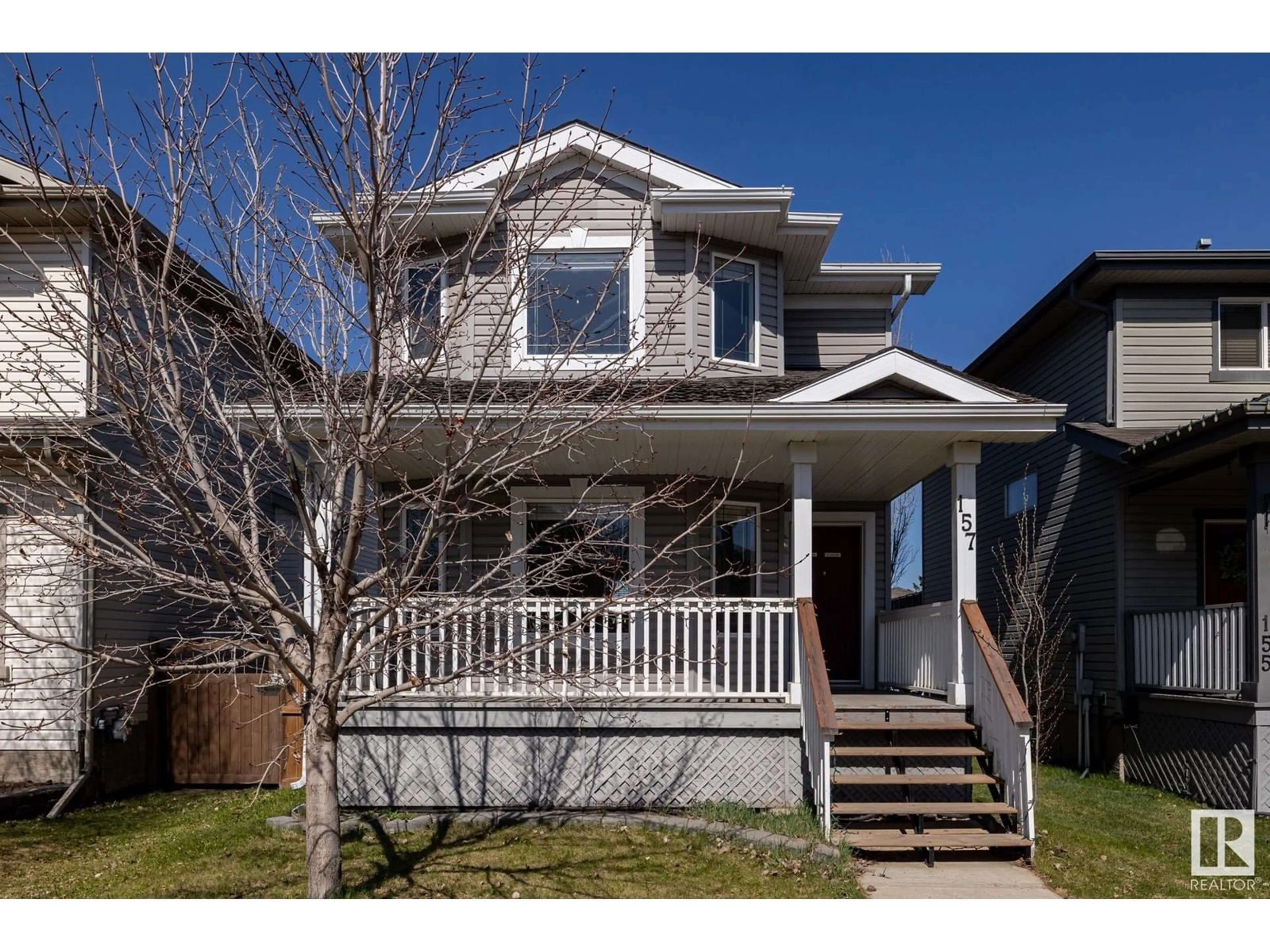 Home with vinyl exterior material, street for 157 BRIDGEPORT BV, Leduc Alberta T9E0H8