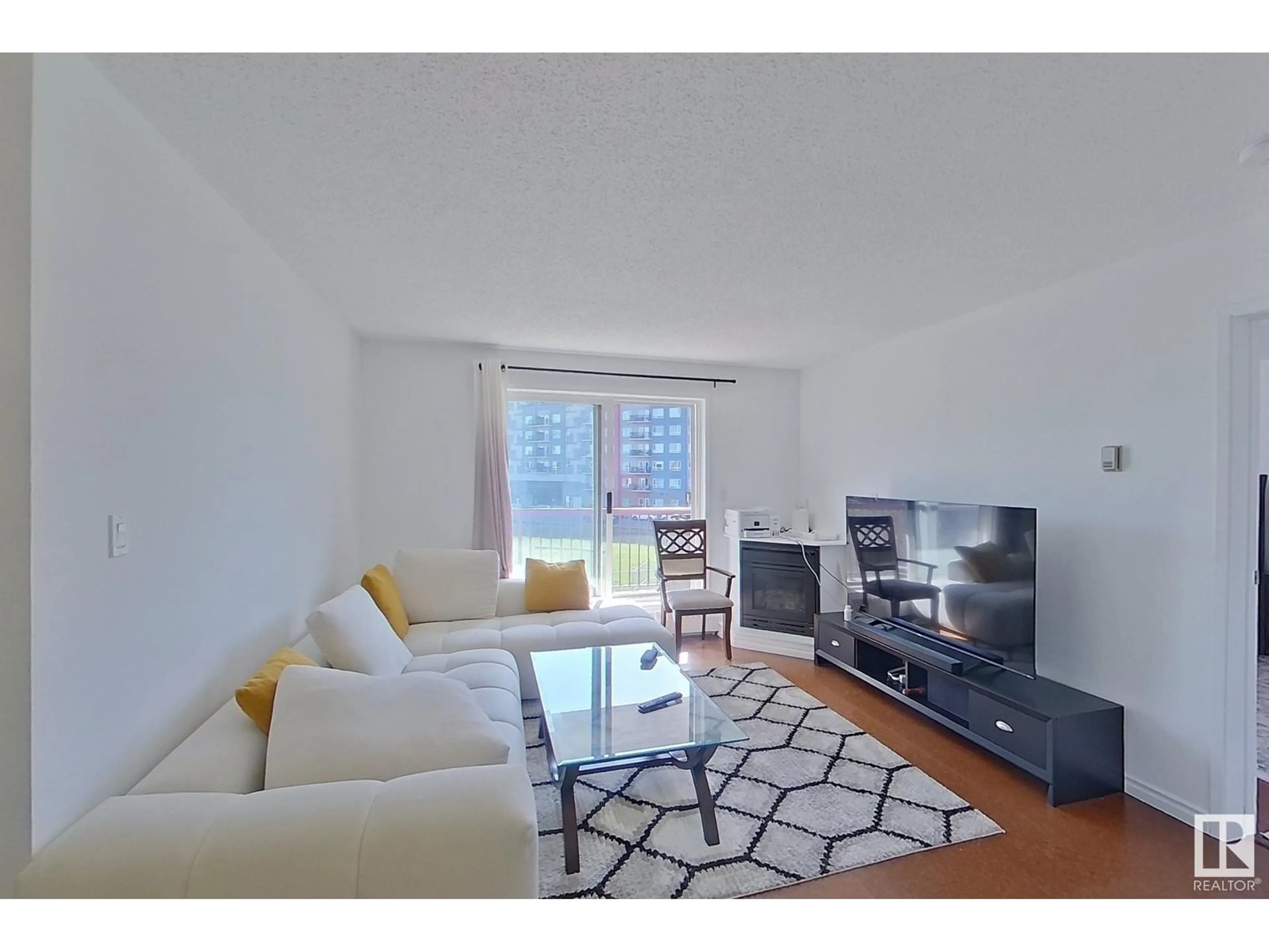 Living room with furniture, unknown for 10520 - 353 120 ST NW, Edmonton Alberta T5H4L9