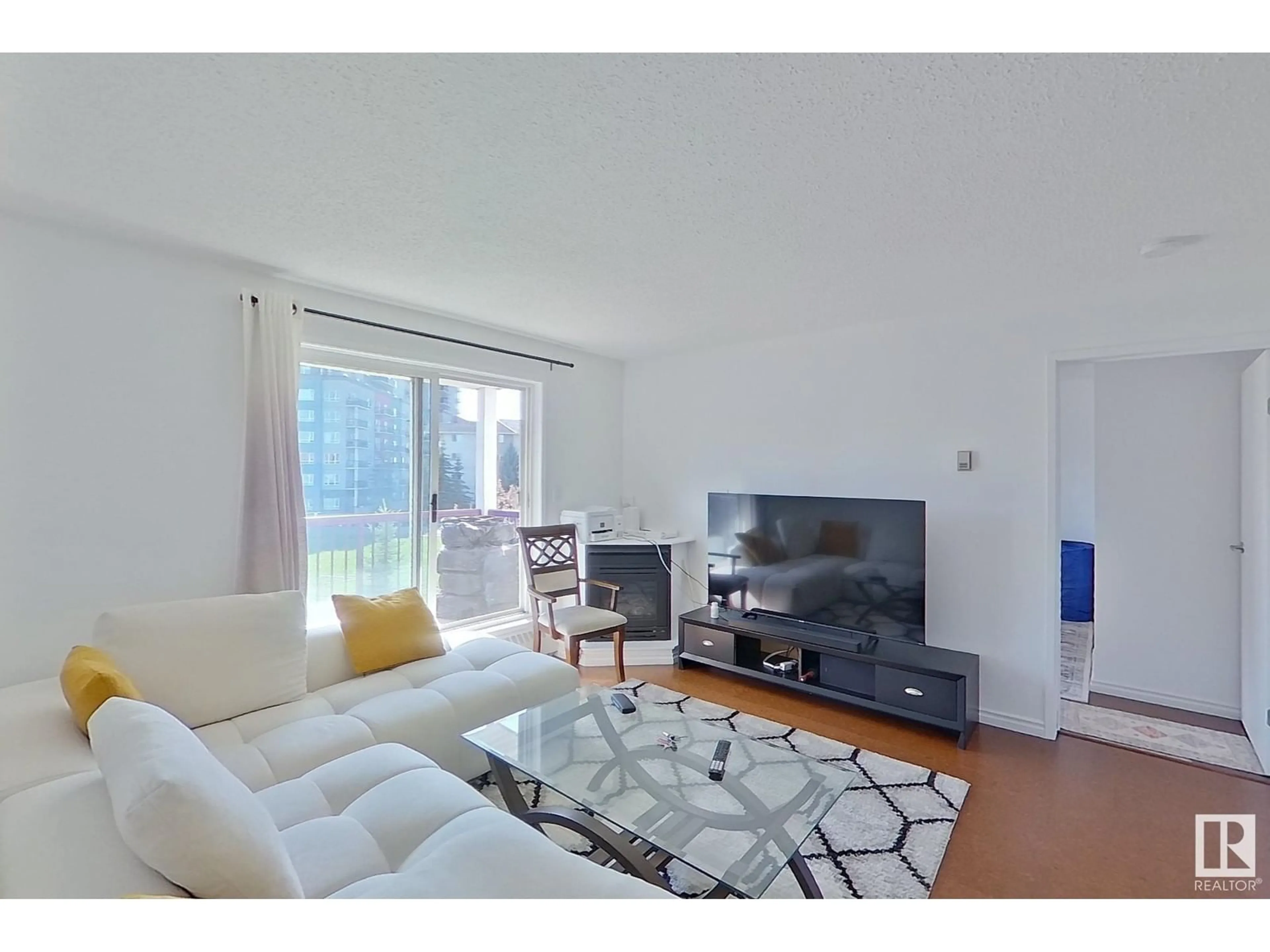 Living room with furniture, unknown for 10520 - 353 120 ST NW, Edmonton Alberta T5H4L9