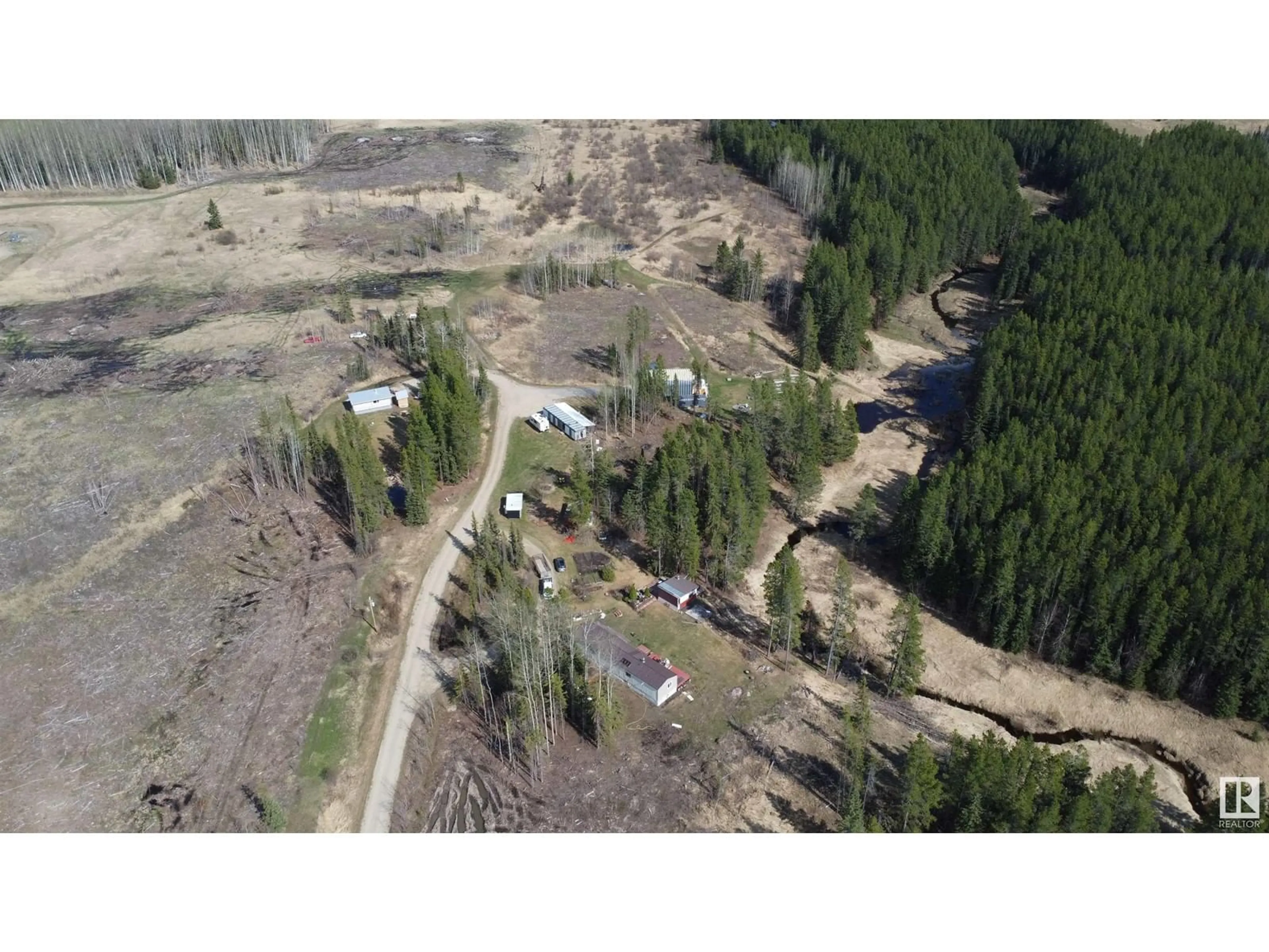 A pic from outside/outdoor area/front of a property/back of a property/a pic from drone, forest/trees view for B,C,D - 450059 HWY 22, Rural Wetaskiwin County Alberta T0C0T0