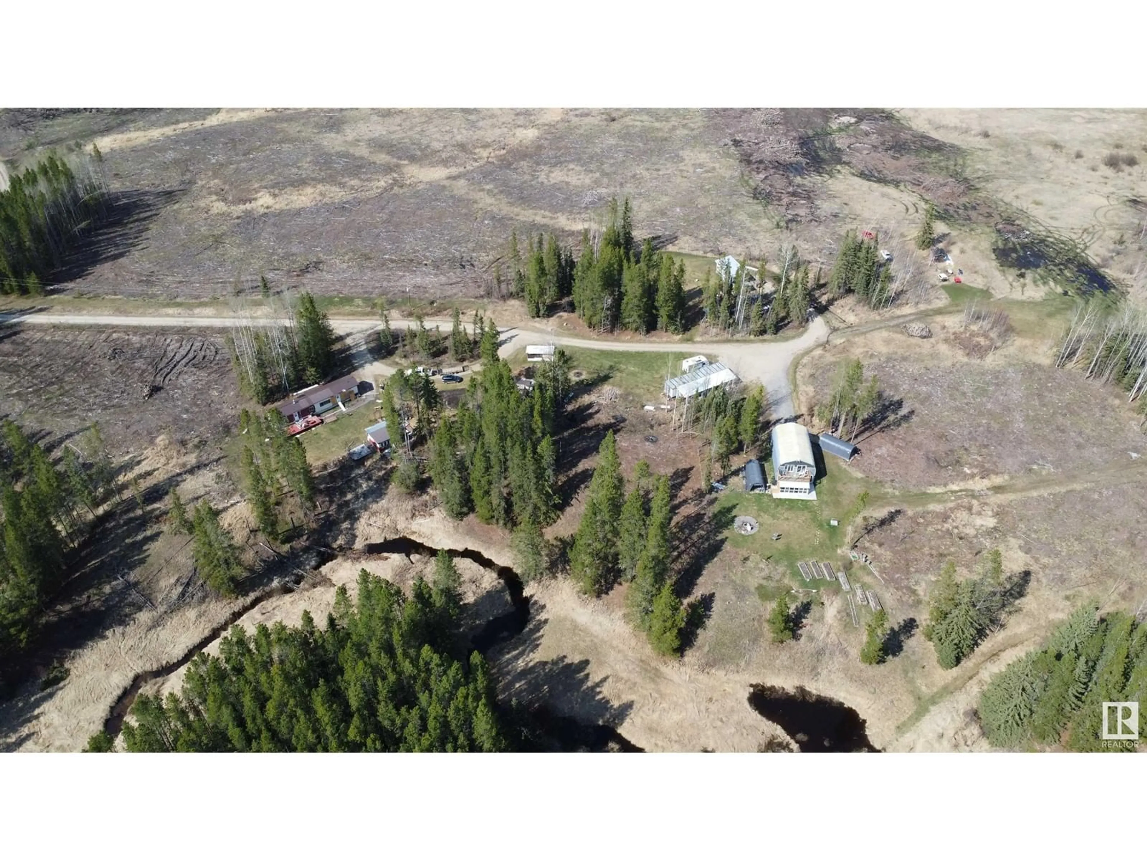 A pic from outside/outdoor area/front of a property/back of a property/a pic from drone, unknown for B,C,D - 450059 HWY 22, Rural Wetaskiwin County Alberta T0C0T0