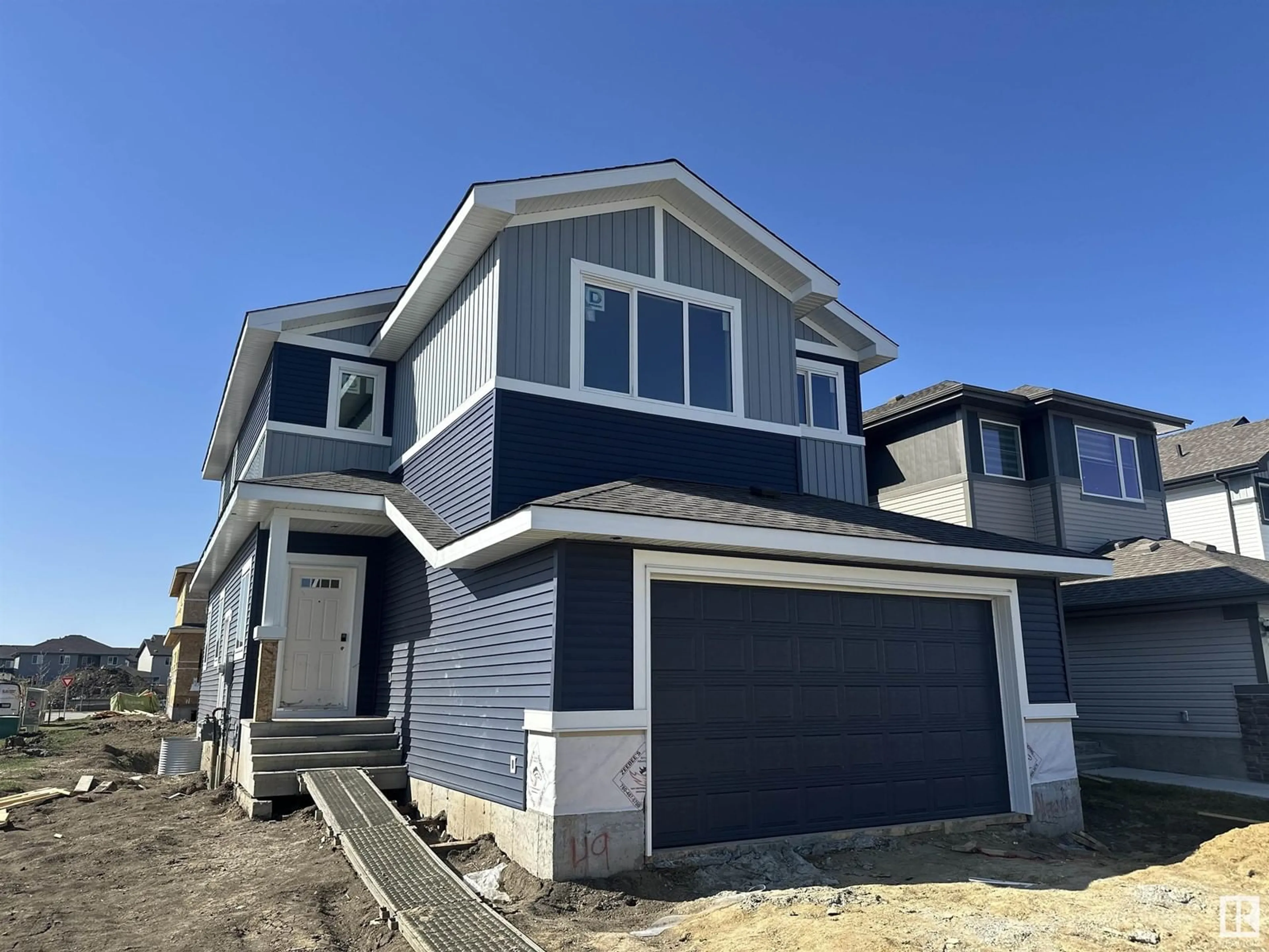 Home with vinyl exterior material, street for 49 SEQUOIA BN, Fort Saskatchewan Alberta T8L0J2