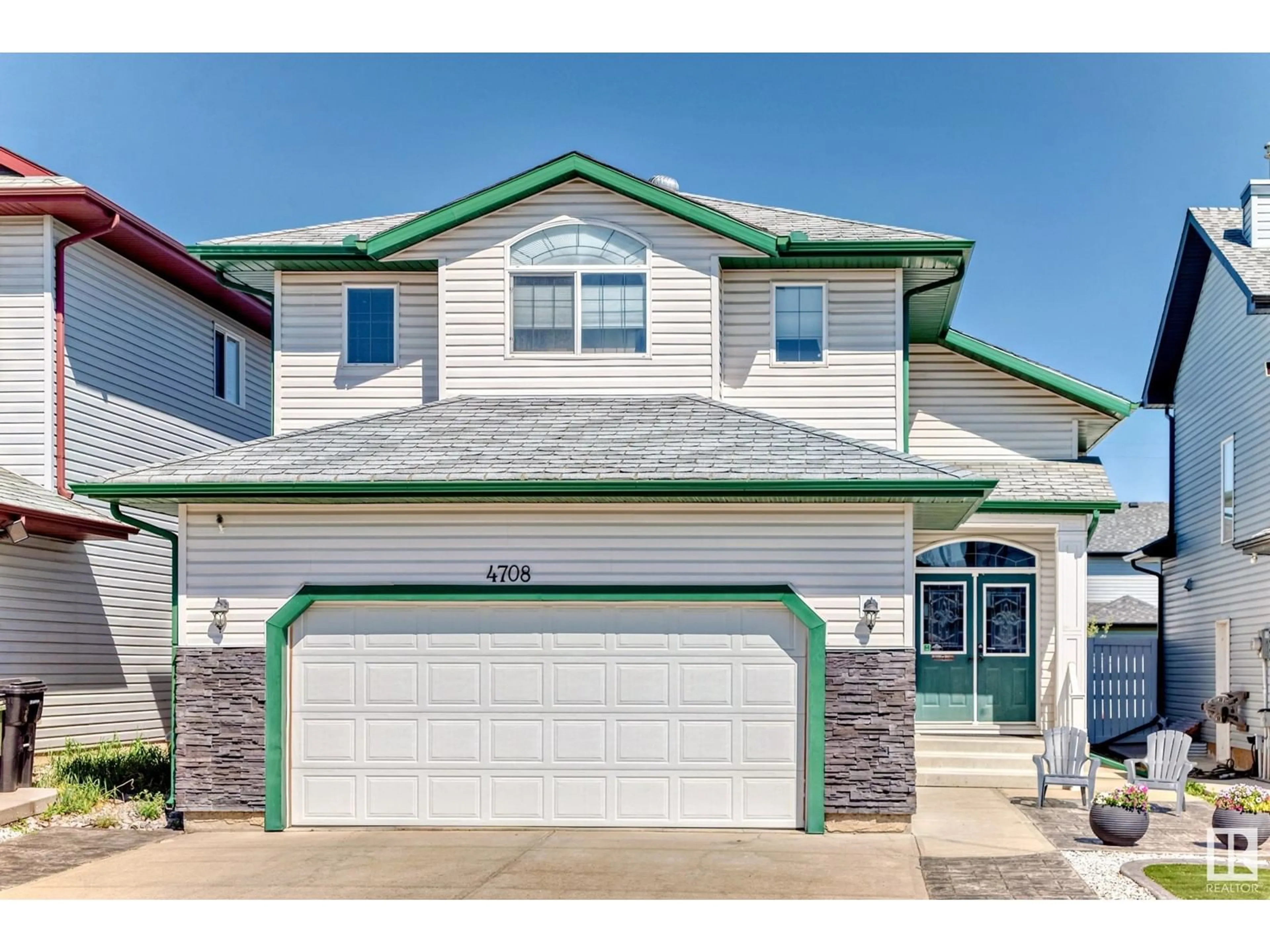 Home with vinyl exterior material, street for 4708 164 AV, Edmonton Alberta T5Y0A5