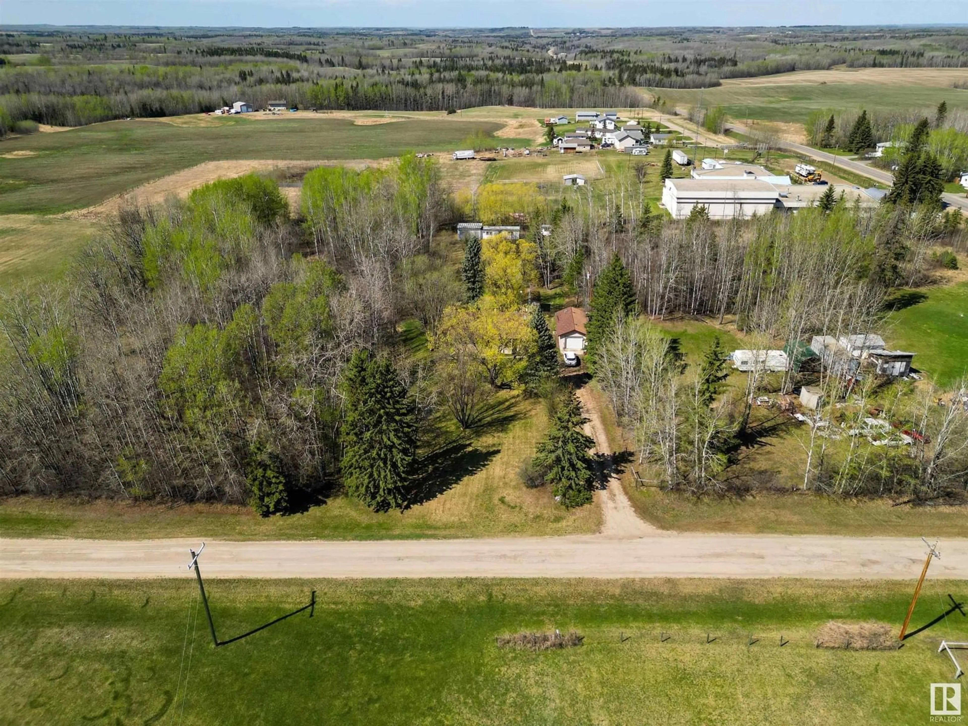 A pic from outside/outdoor area/front of a property/back of a property/a pic from drone, unknown for 4902 50 ST, Rural Brazeau County Alberta T0C1W0