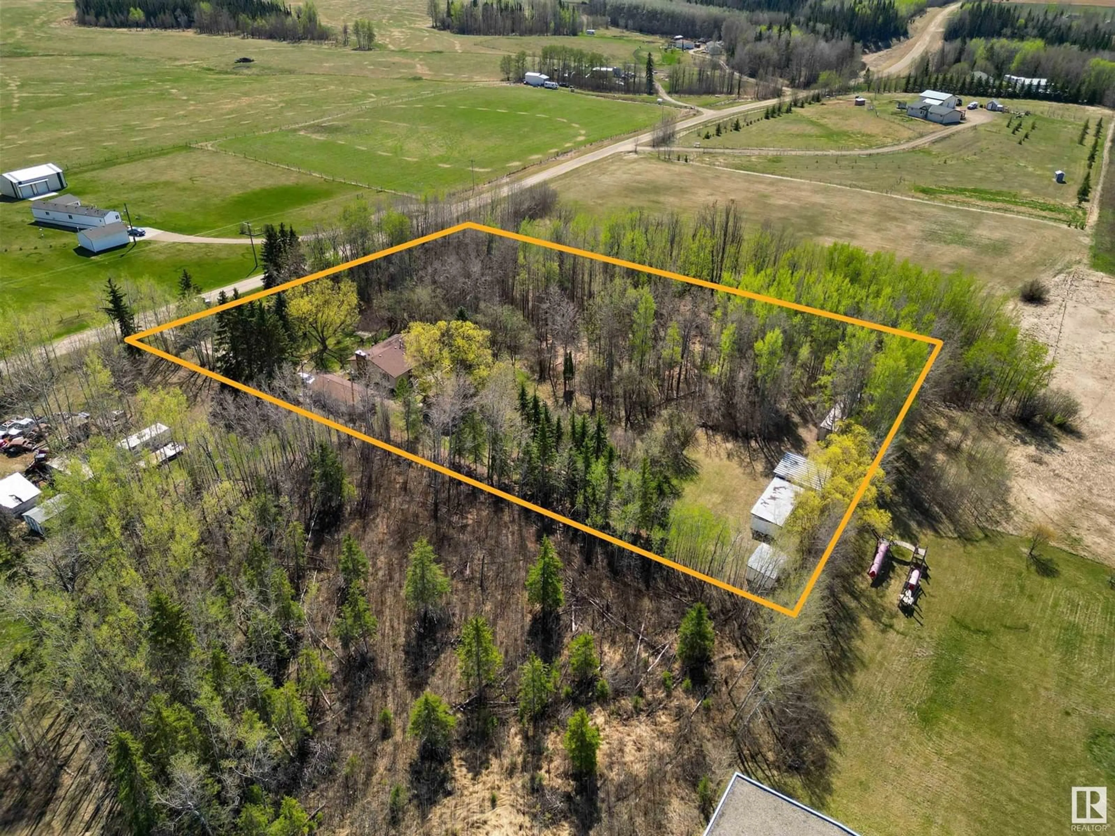 A pic from outside/outdoor area/front of a property/back of a property/a pic from drone, forest/trees view for 4902 50 ST, Rural Brazeau County Alberta T0C1W0