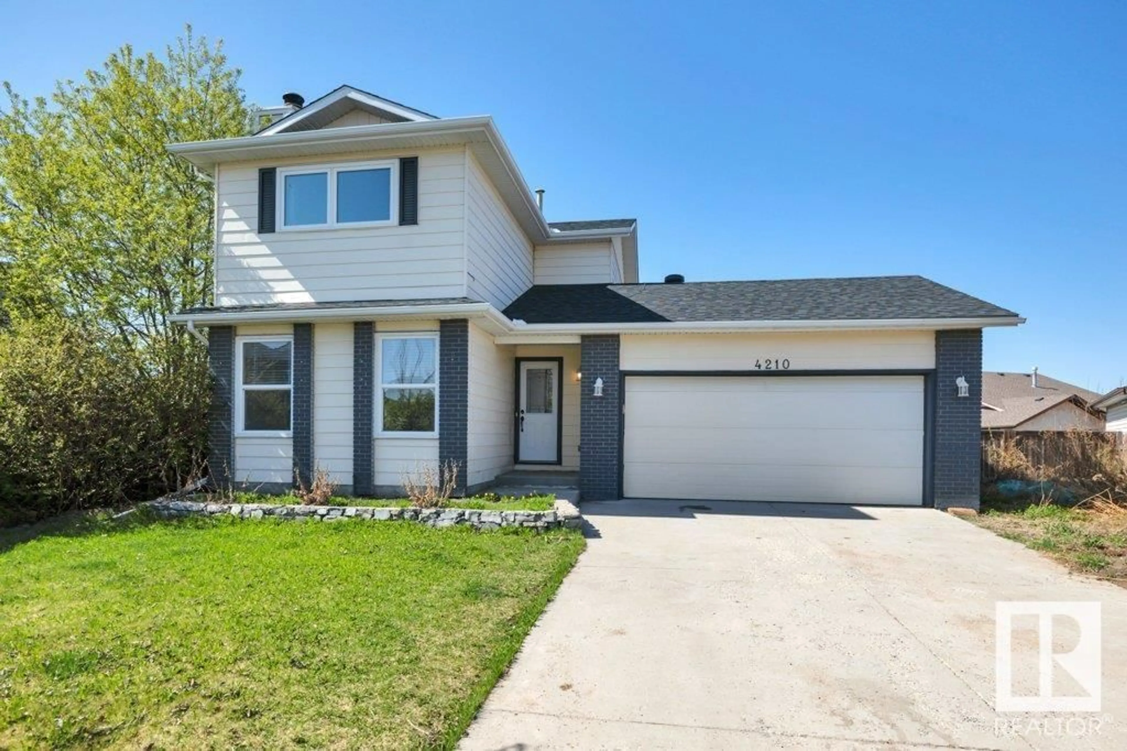 Home with vinyl exterior material, street for 4210 33 AV, Leduc Alberta T9E6B7