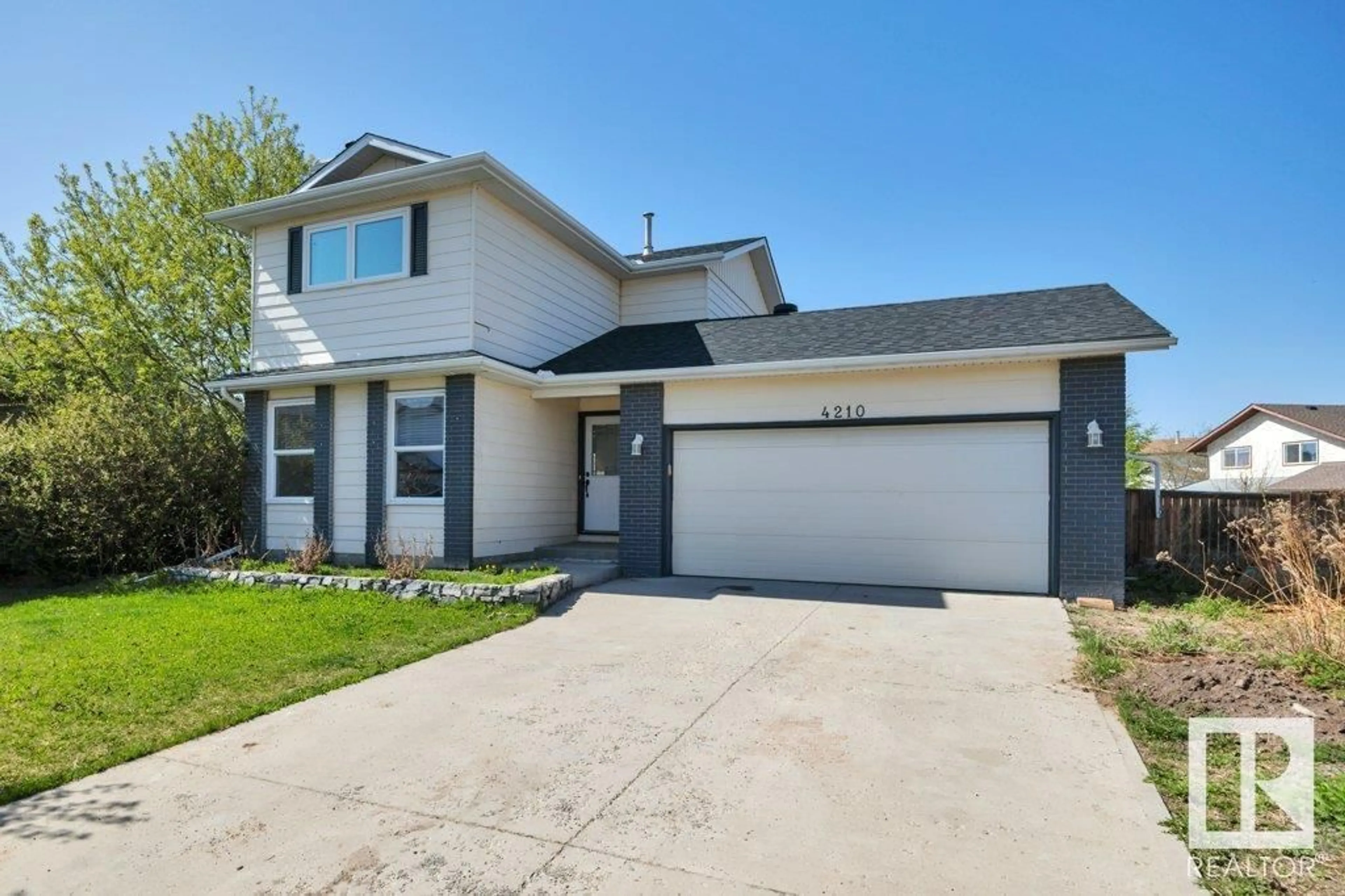 Home with vinyl exterior material, street for 4210 33 AV, Leduc Alberta T9E6B7