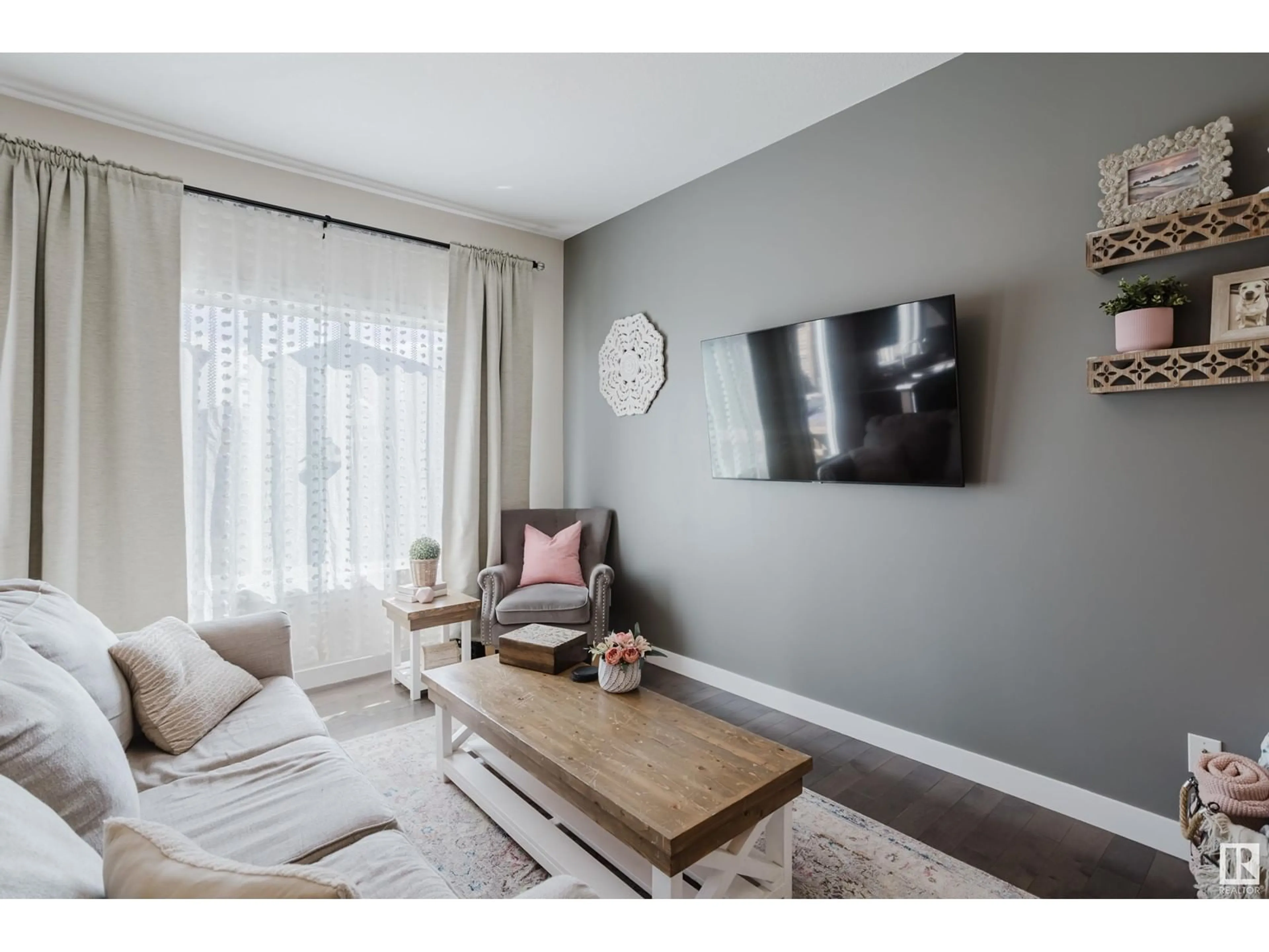 Living room with furniture, wood/laminate floor for 19 PRESCOTT BV, Spruce Grove Alberta T7X0R5
