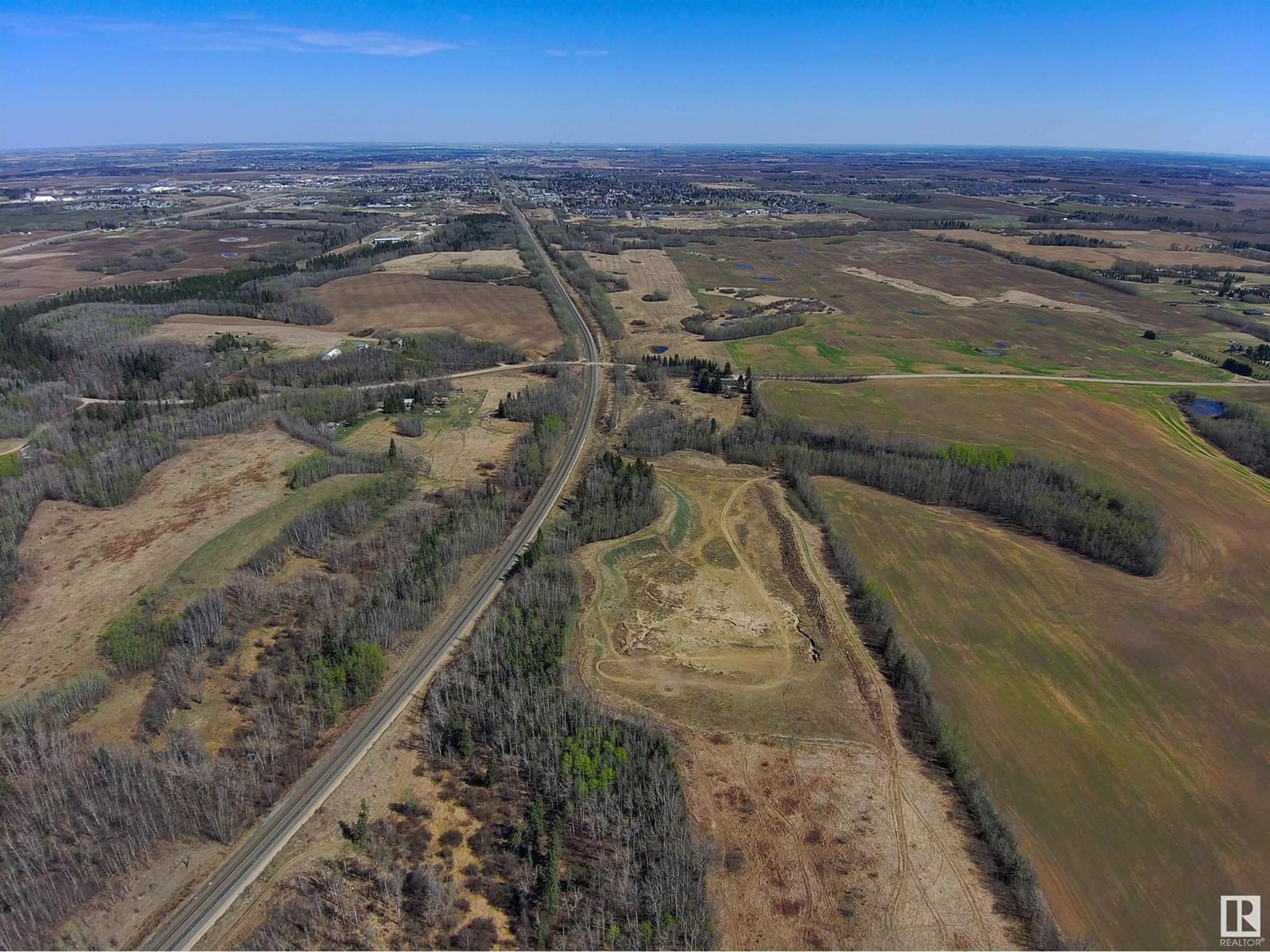 A pic from outside/outdoor area/front of a property/back of a property/a pic from drone, water/lake/river/ocean view for 52502 RGE ROAD 12, Rural Parkland County Alberta T7Y2B9