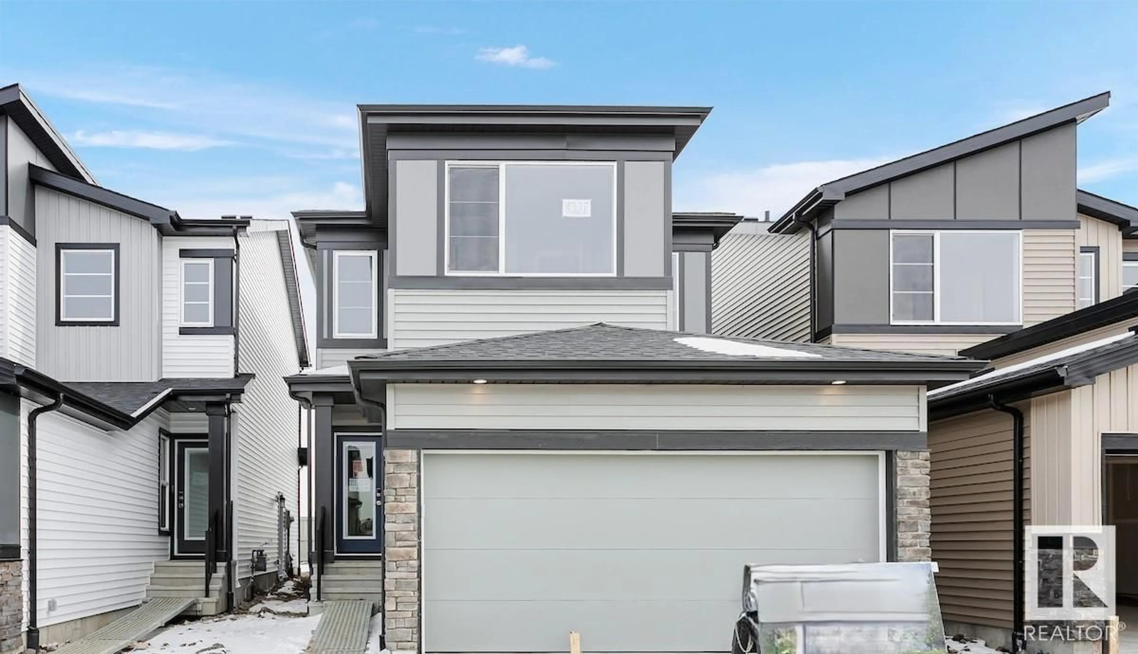 Home with vinyl exterior material, street for 2607 5 AV, Edmonton Alberta T6X3J1