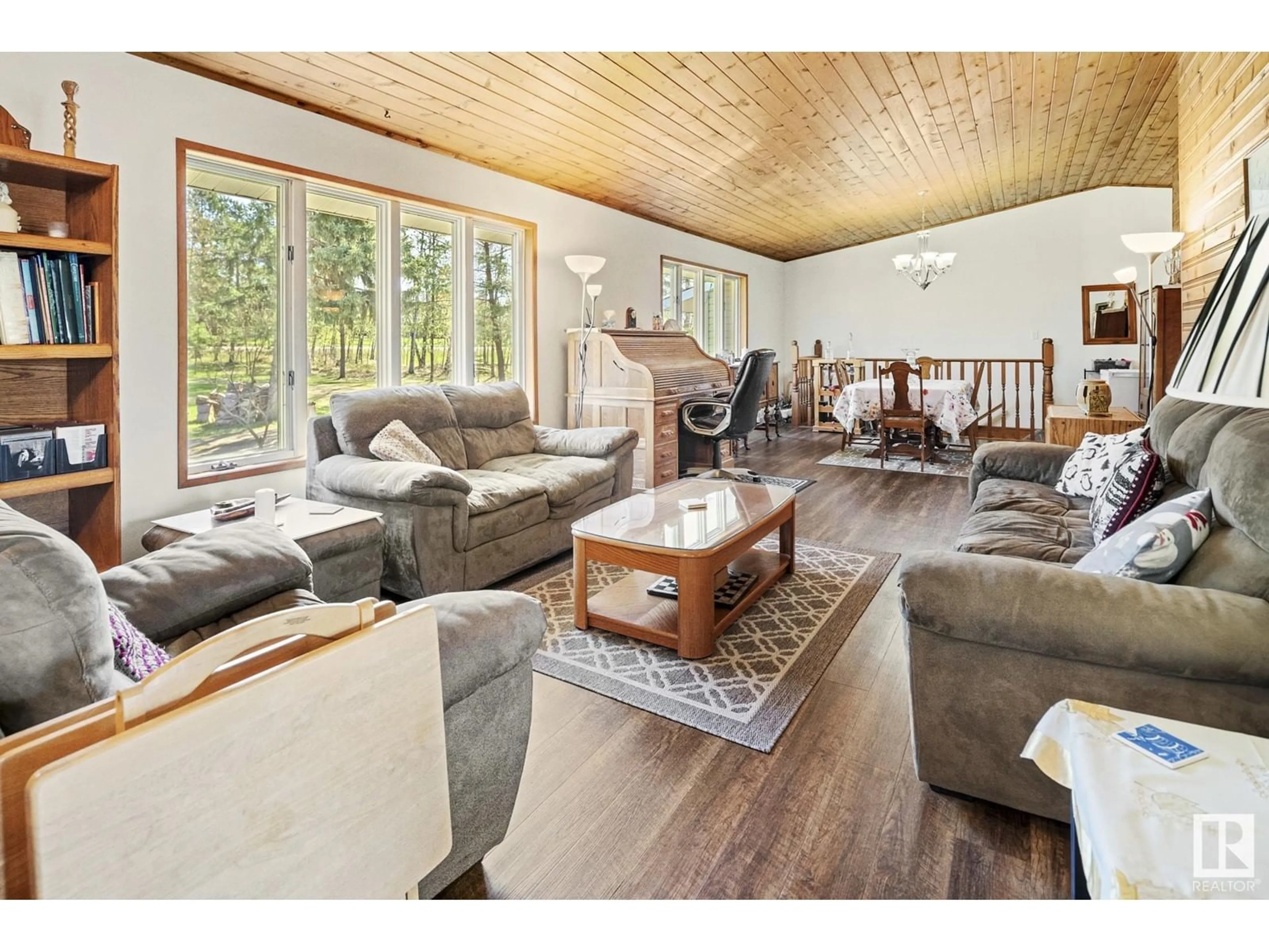 Living room with furniture, wood/laminate floor for 19 - 56420 RGE ROAD 231, Rural Sturgeon County Alberta T0A1N4