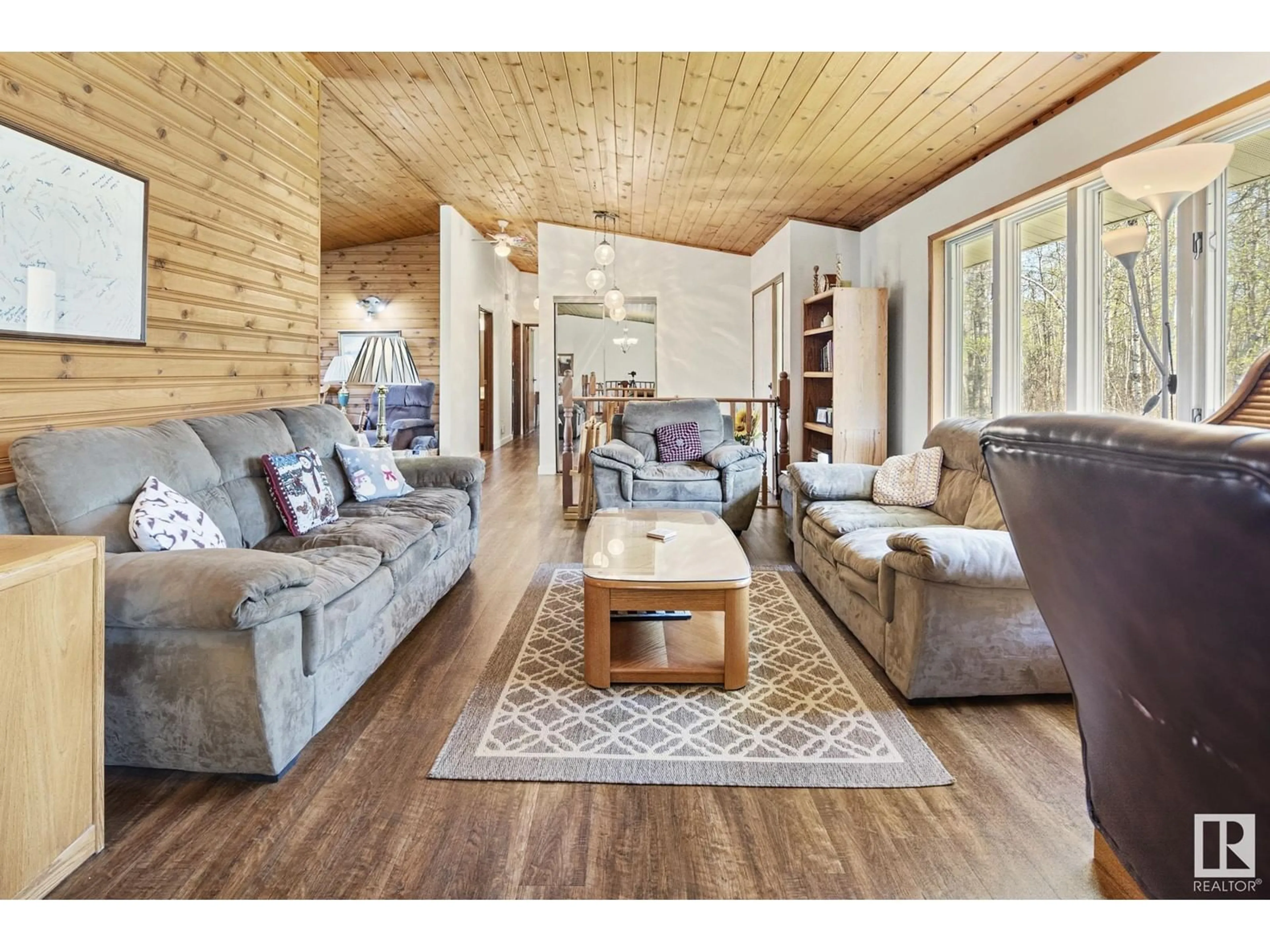 Living room with furniture, wood/laminate floor for 19 - 56420 RGE ROAD 231, Rural Sturgeon County Alberta T0A1N4