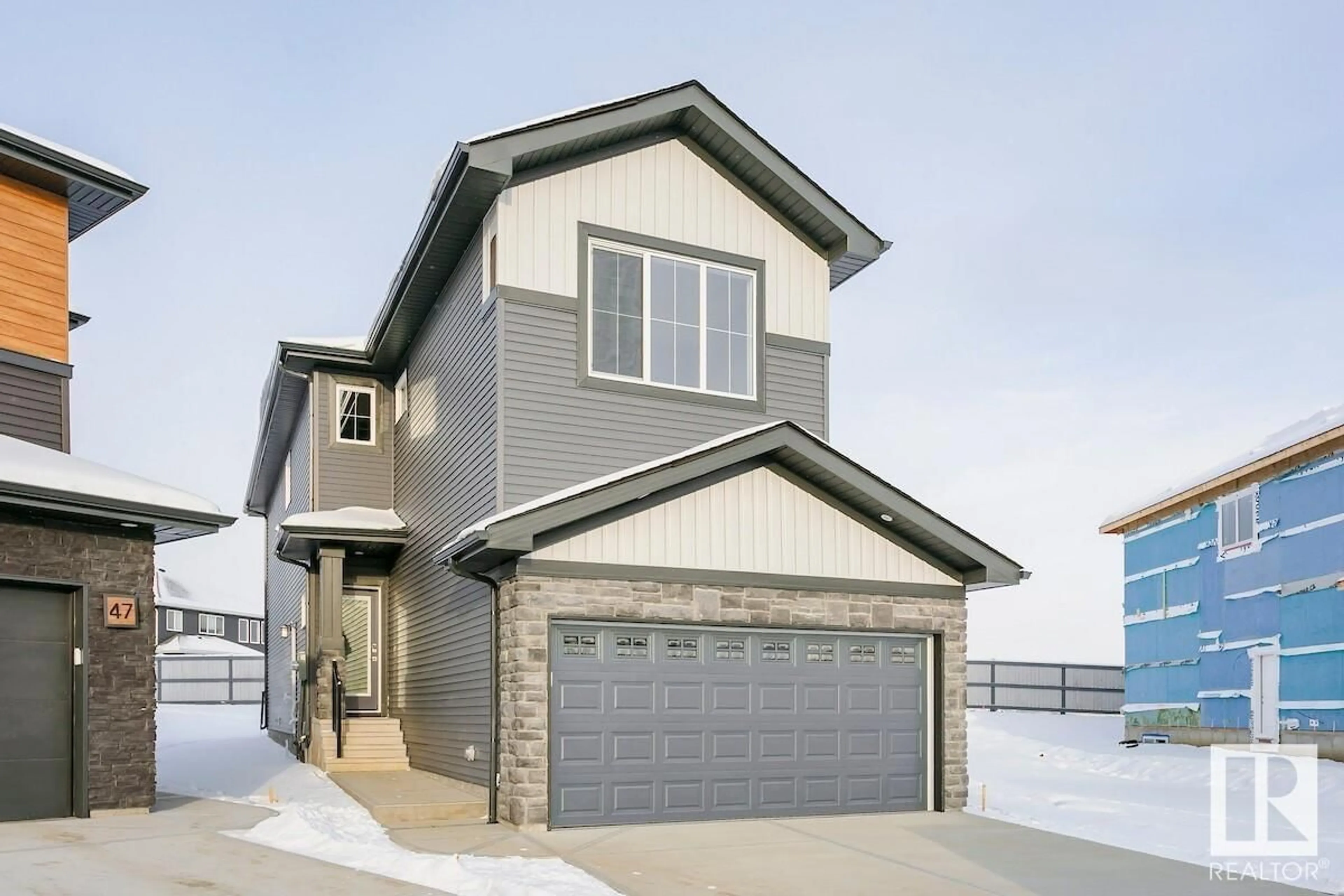 Home with vinyl exterior material, street for 2416 EGRET LO, Edmonton Alberta T6M3G9