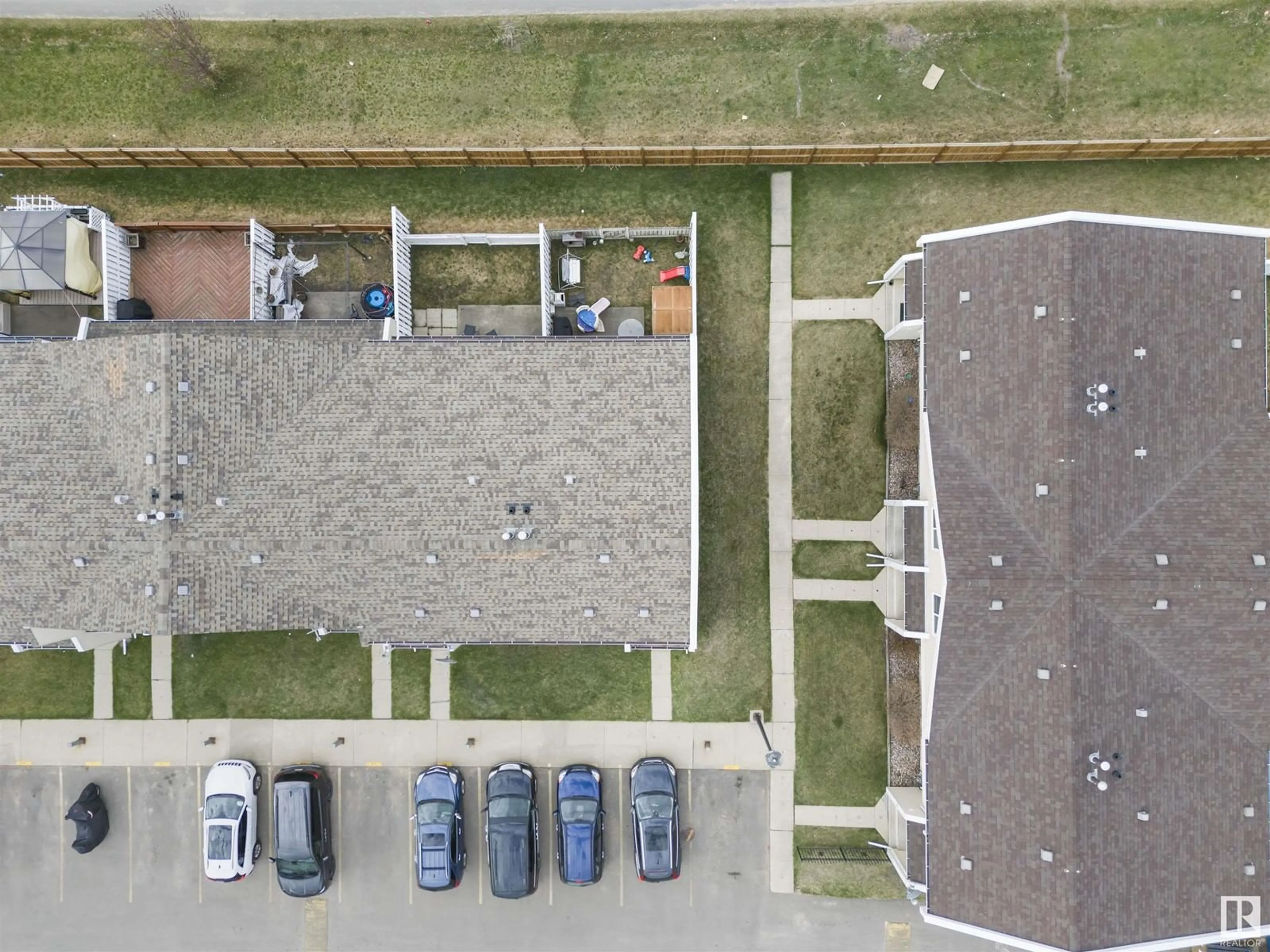 A pic from outside/outdoor area/front of a property/back of a property/a pic from drone, street for 100 - 67 16567 ST, Edmonton Alberta T5X5H4