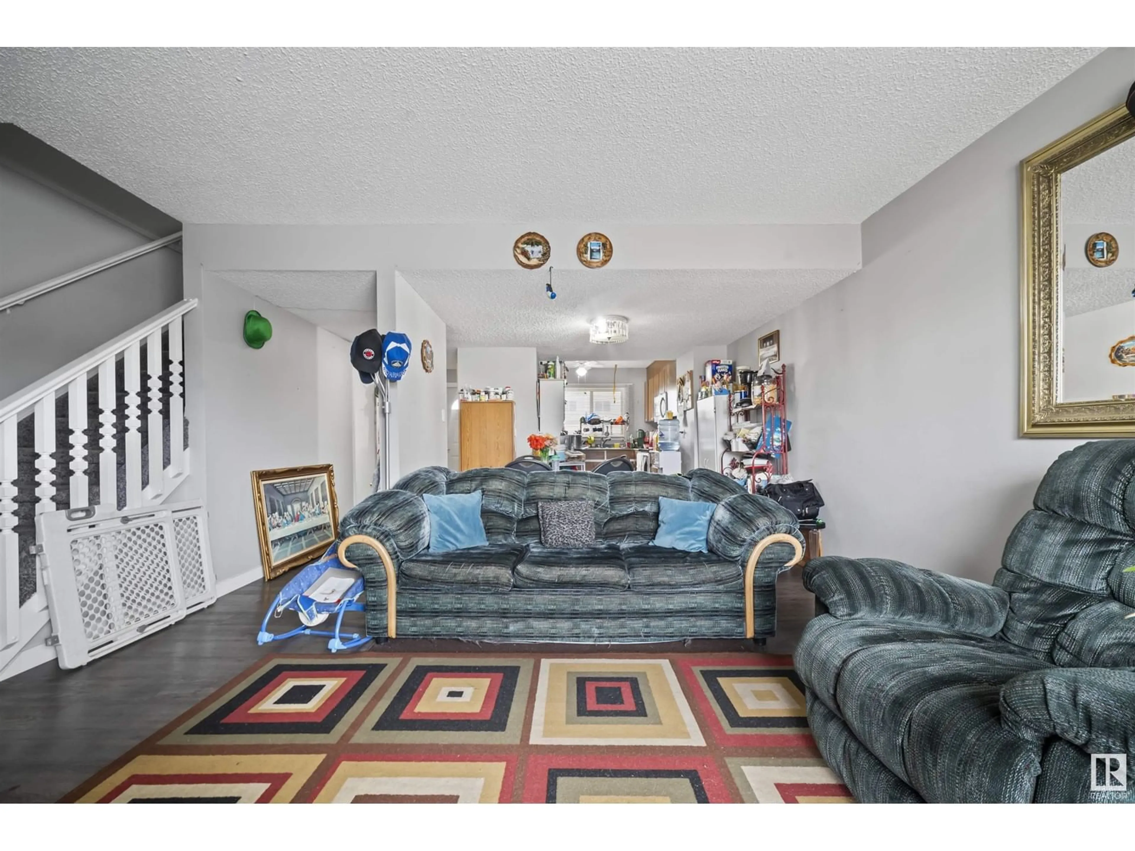 Living room with furniture, unknown for 100 - 67 16567 ST, Edmonton Alberta T5X5H4