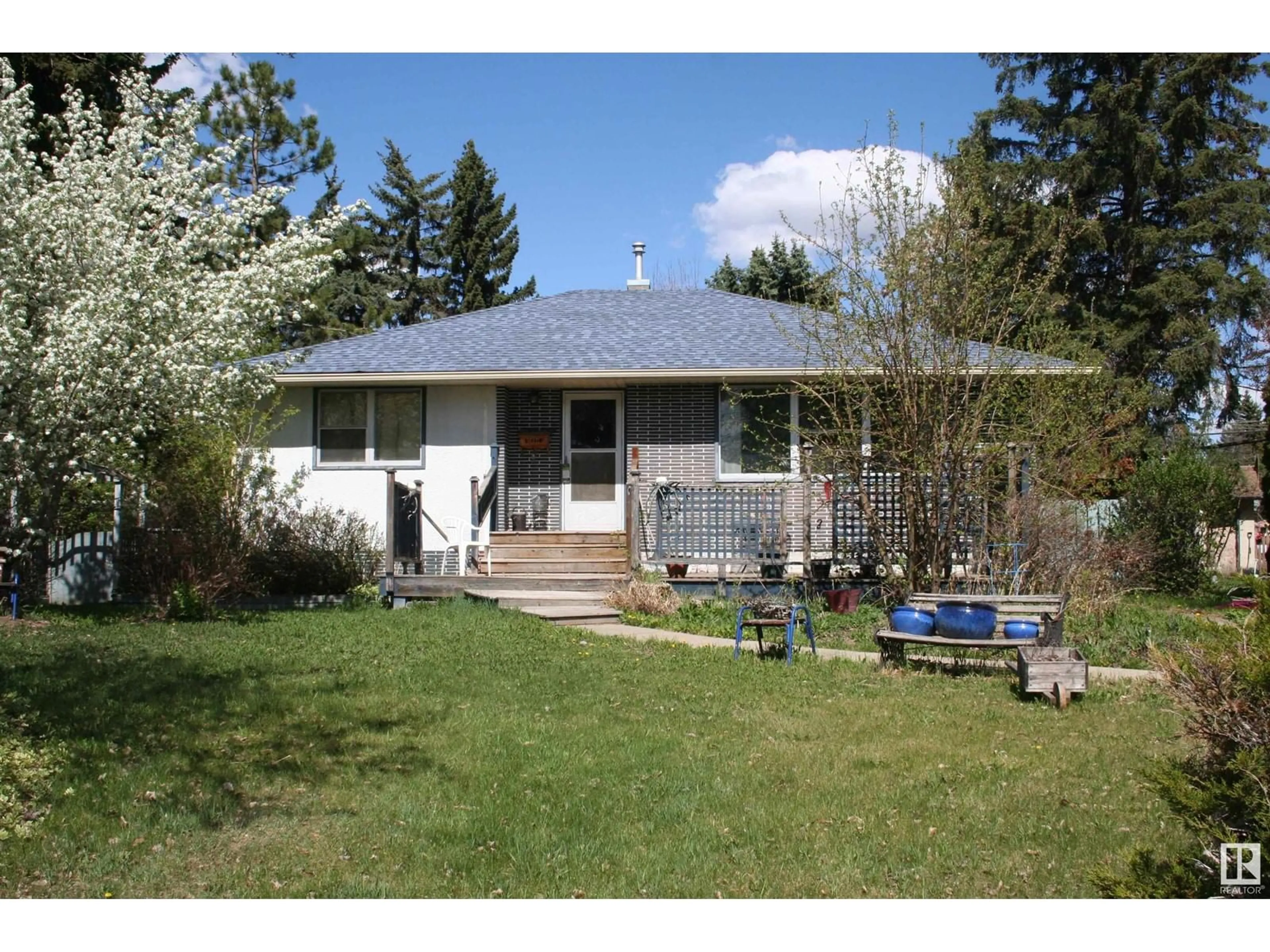 Home with vinyl exterior material, street for 14532 106A AV, Edmonton Alberta T5N1E6