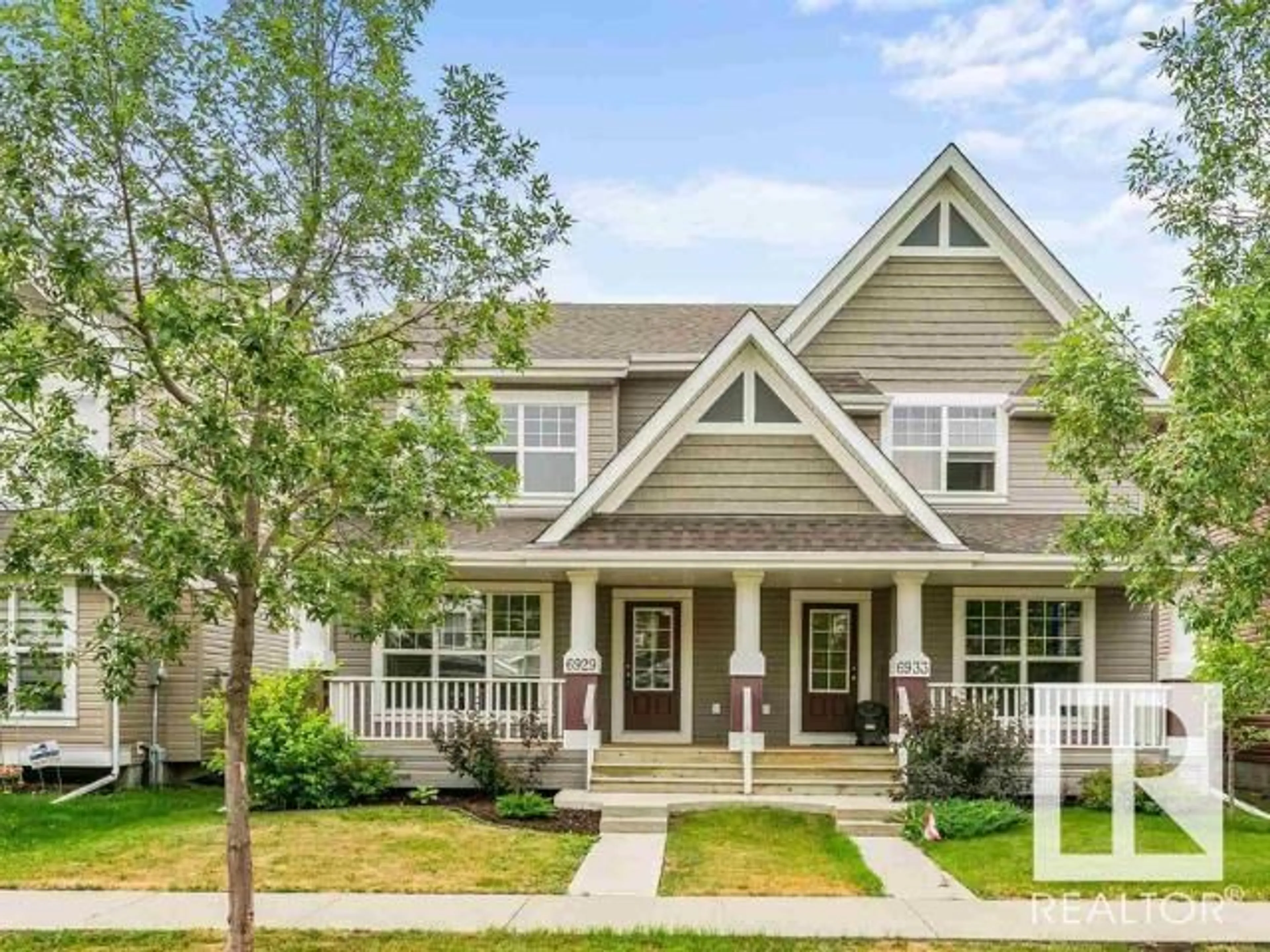 Home with vinyl exterior material, street for 6929 21A AV, Edmonton Alberta T8B1A4