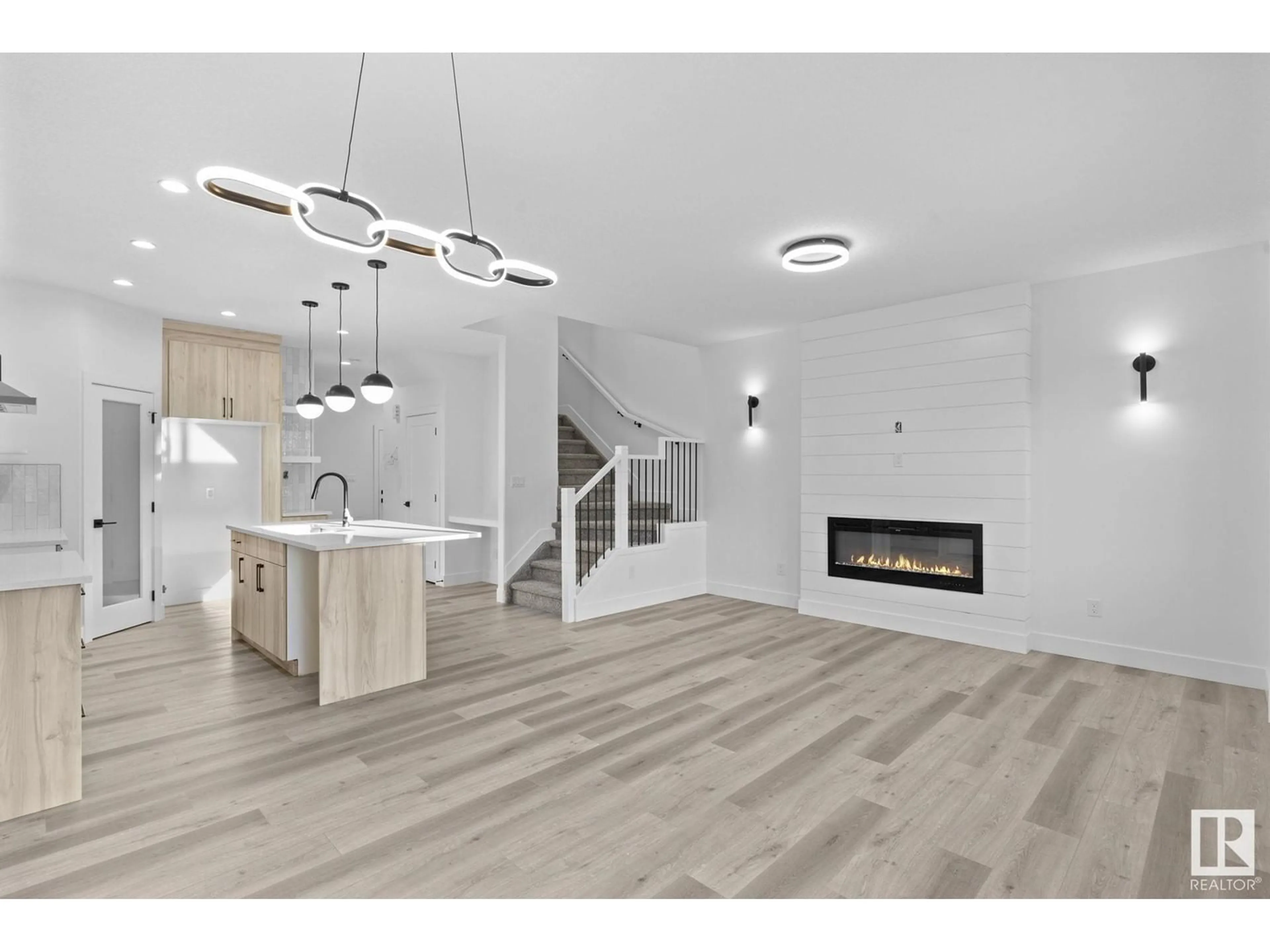 Open concept kitchen, wood/laminate floor for NW - 8823 181 AV, Edmonton Alberta T5Z0X4