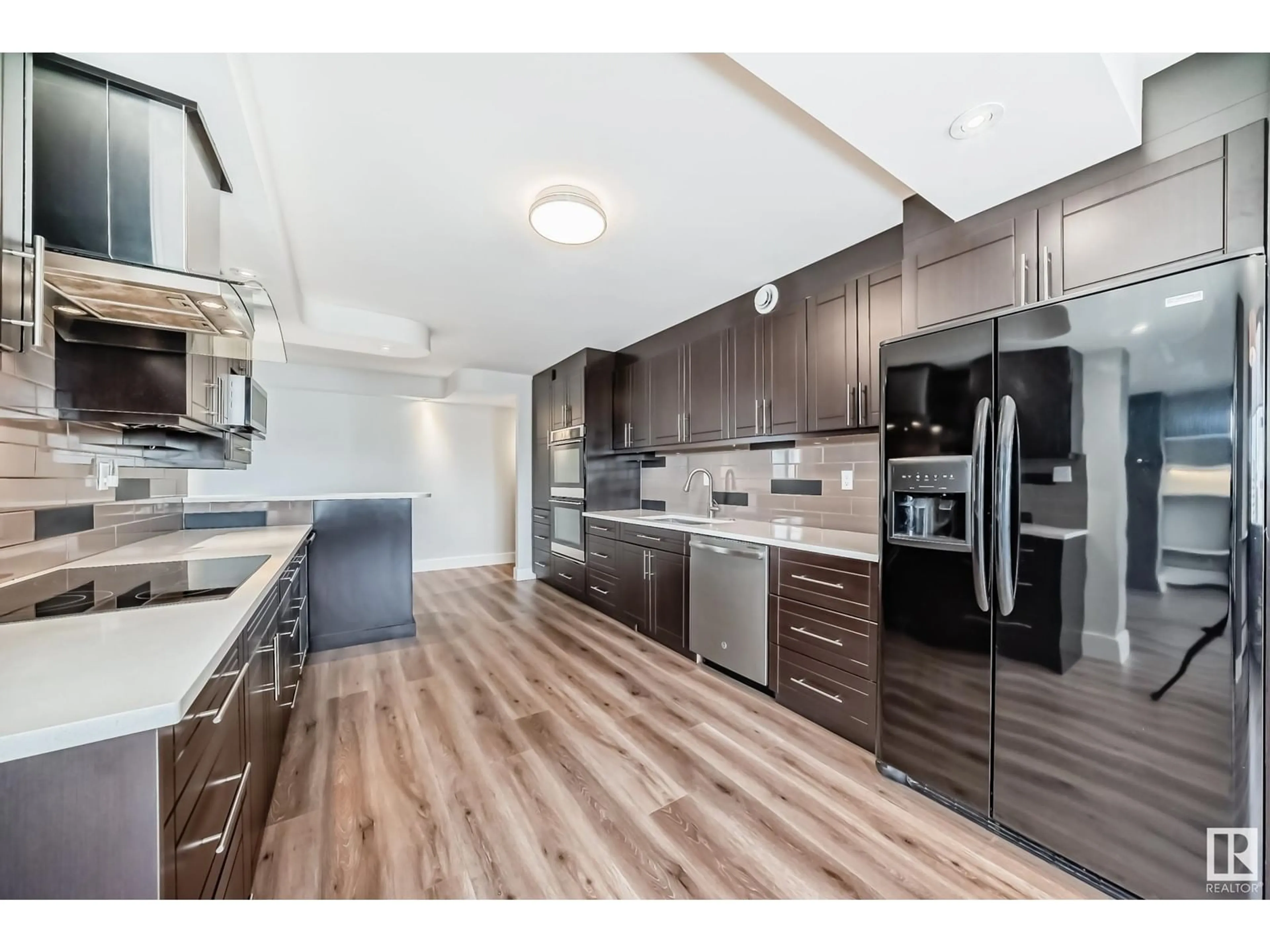 Open concept kitchen, unknown for #1403 - 9921 104 ST, Edmonton Alberta T5K2K3