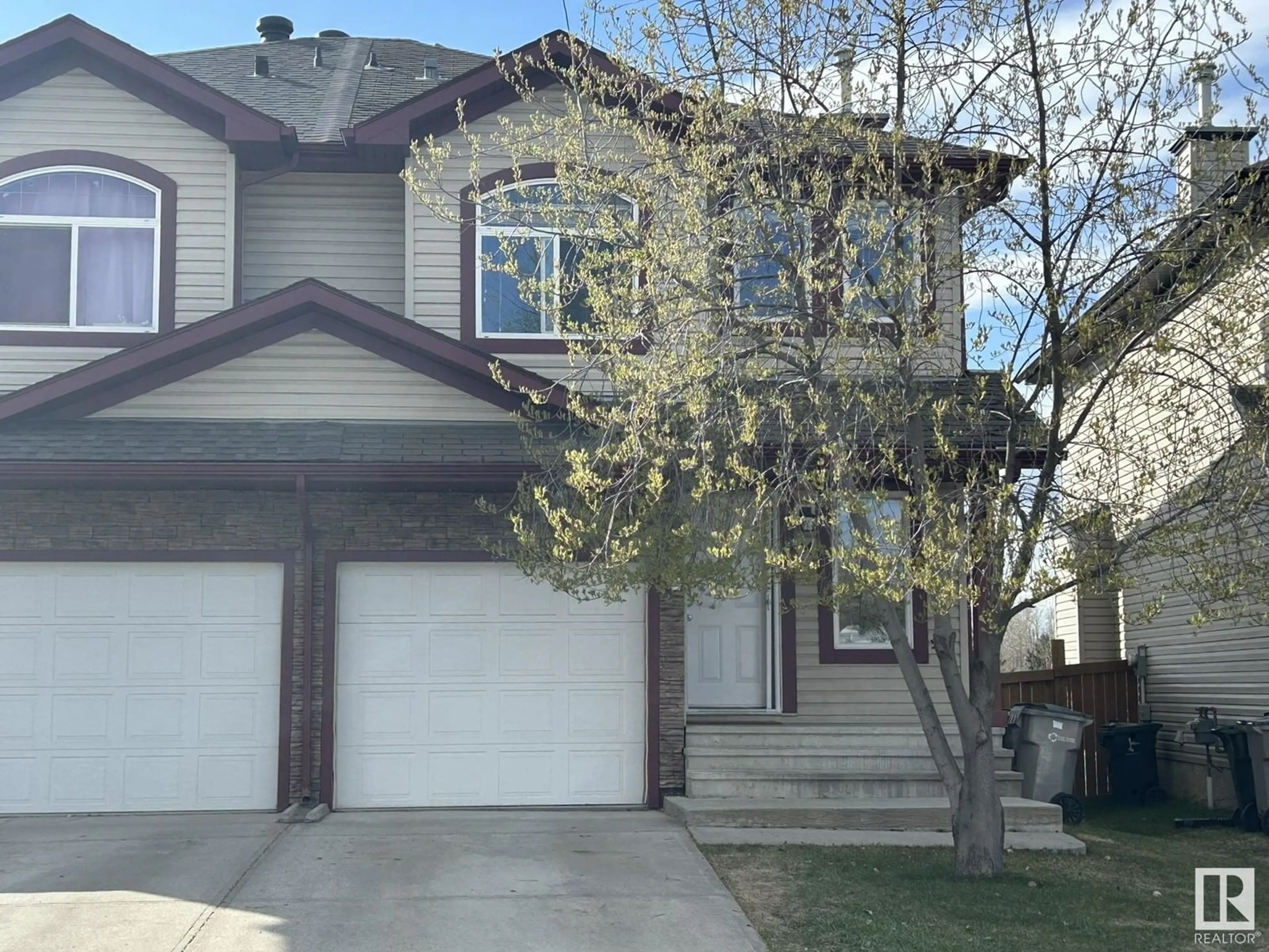 Home with vinyl exterior material, street for 64 MERIDIAN LO, Stony Plain Alberta T7Z0B8